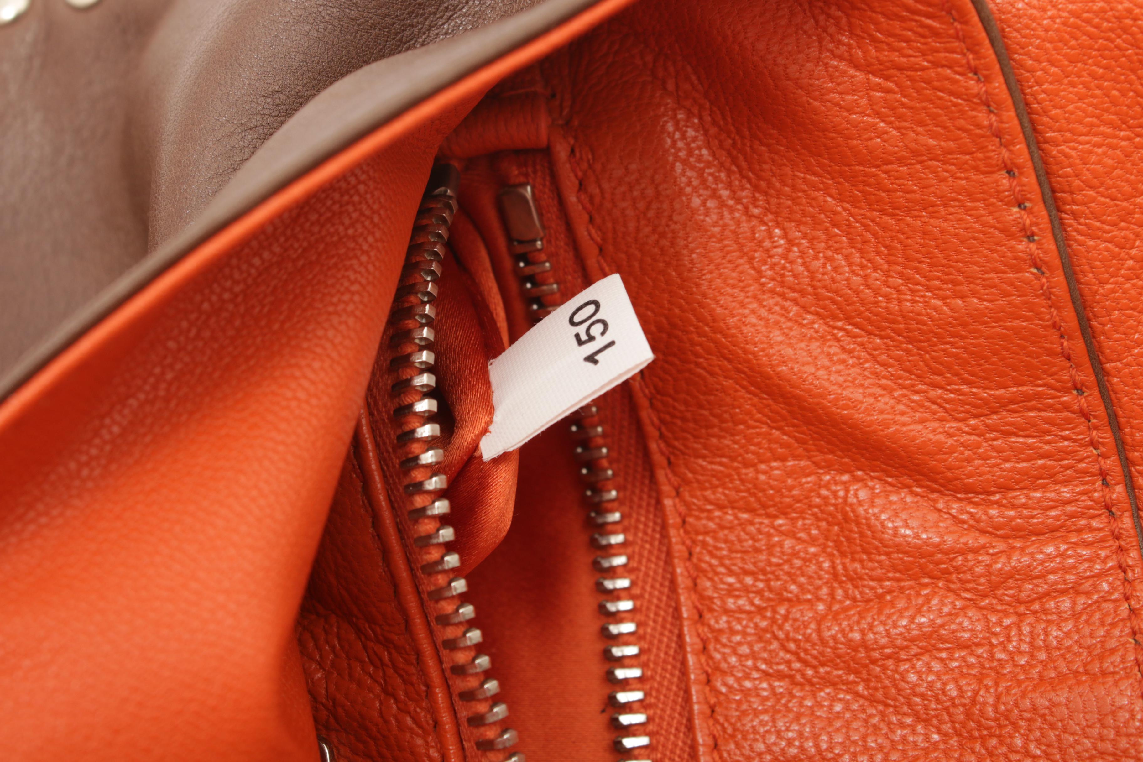 Prada Brown Leather Shoulder Bag with Silver Tone Studs and Tassel