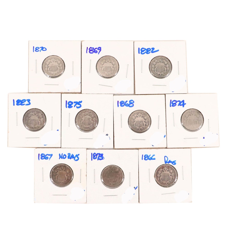 Ten Shield Nickels Featuring an 1867 With Out Rays