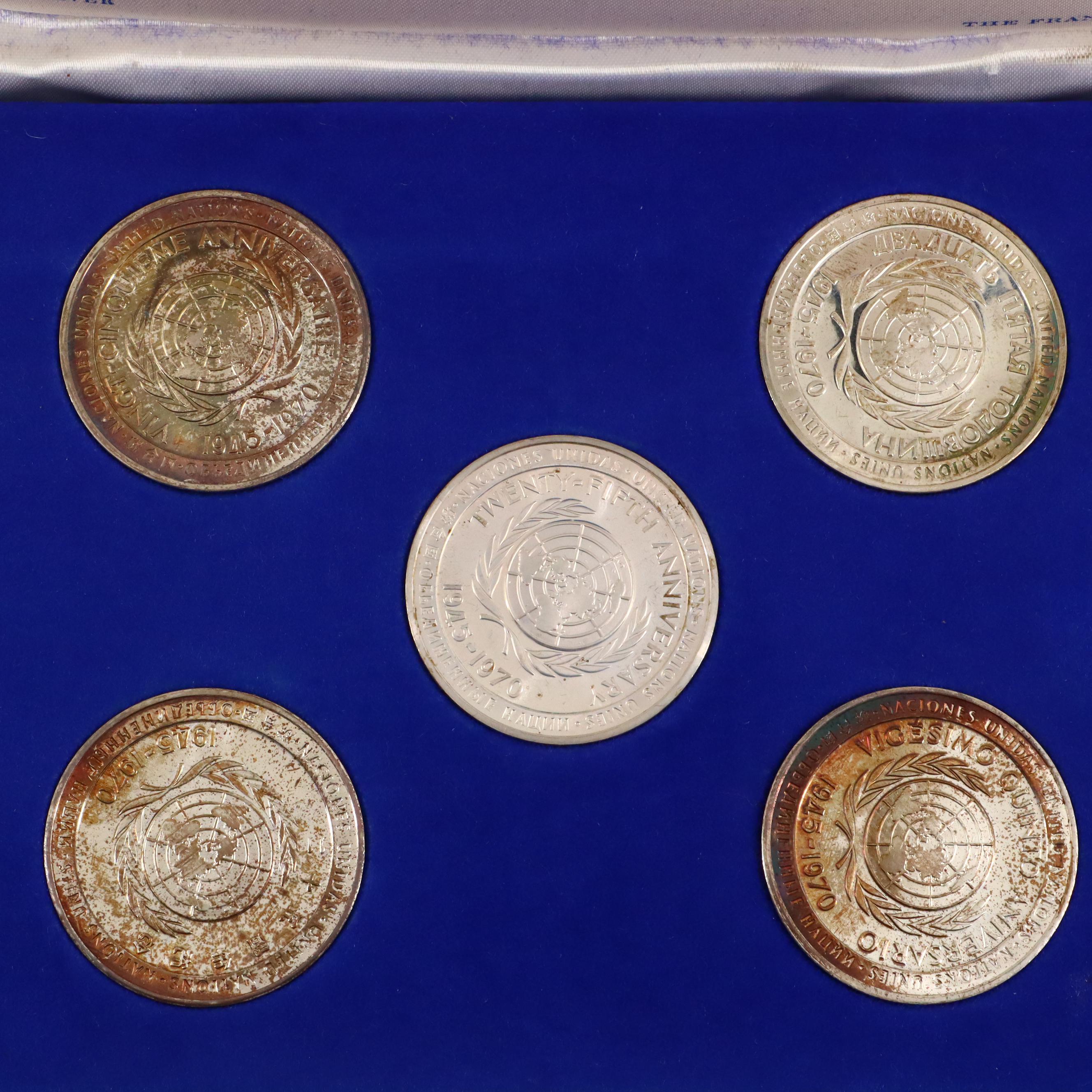A Franklin Mint United Nations 25th Anniversary Commemorative Silver Medal Set