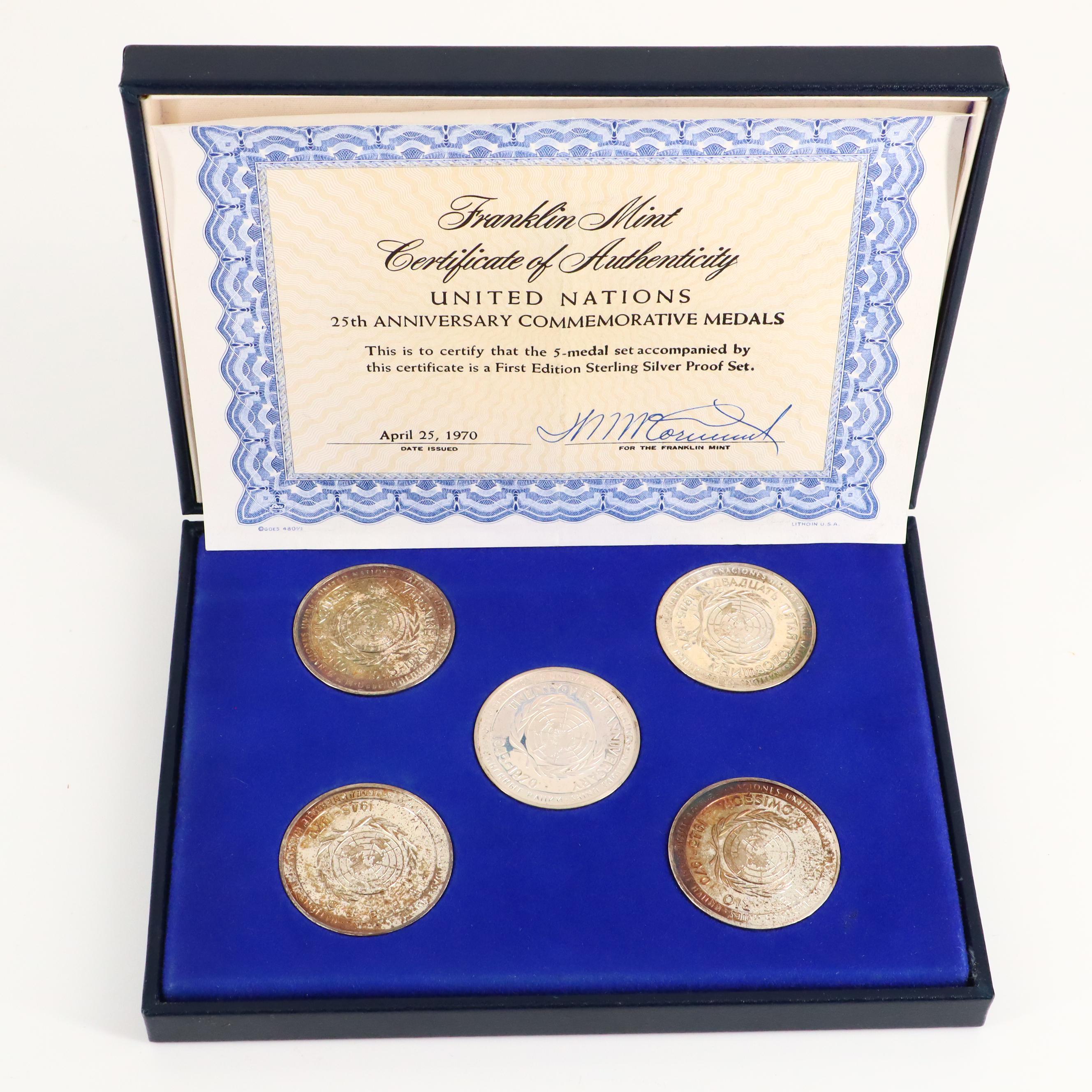 A Franklin Mint United Nations 25th Anniversary Commemorative Silver Medal Set