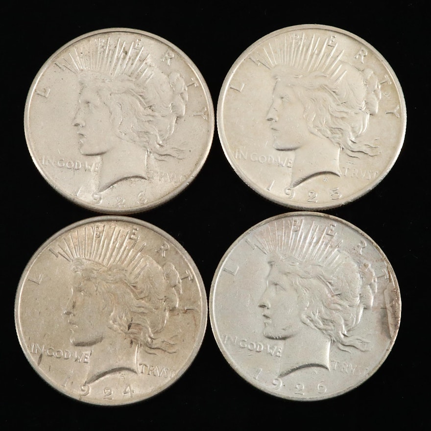 Four Silver Peace Dollars: 1924, 1925, 1926-S, and 1926-D