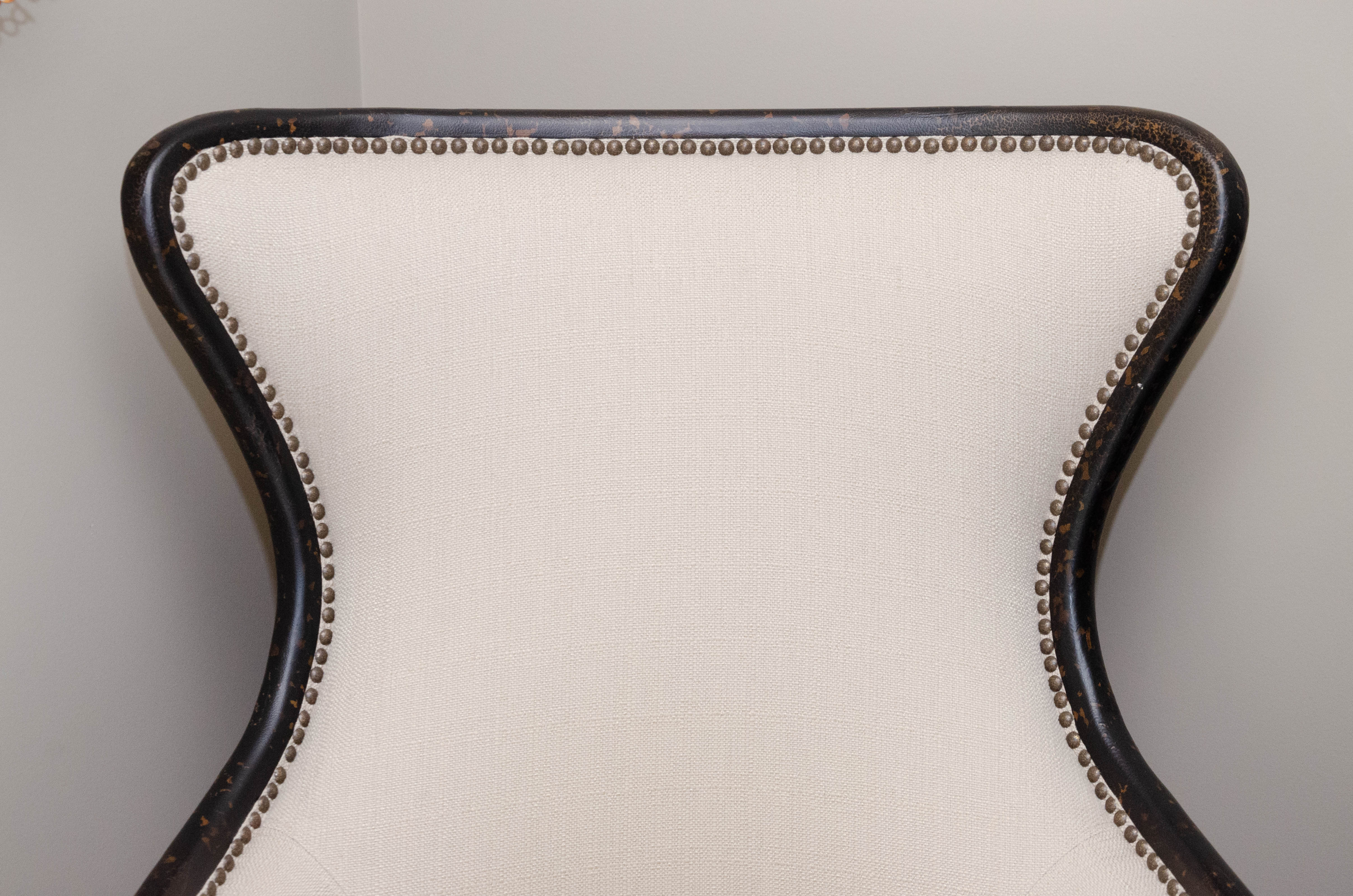 Uttermost Upholstered Armchair with Ebonized Wood Frame and Brass Tack Details