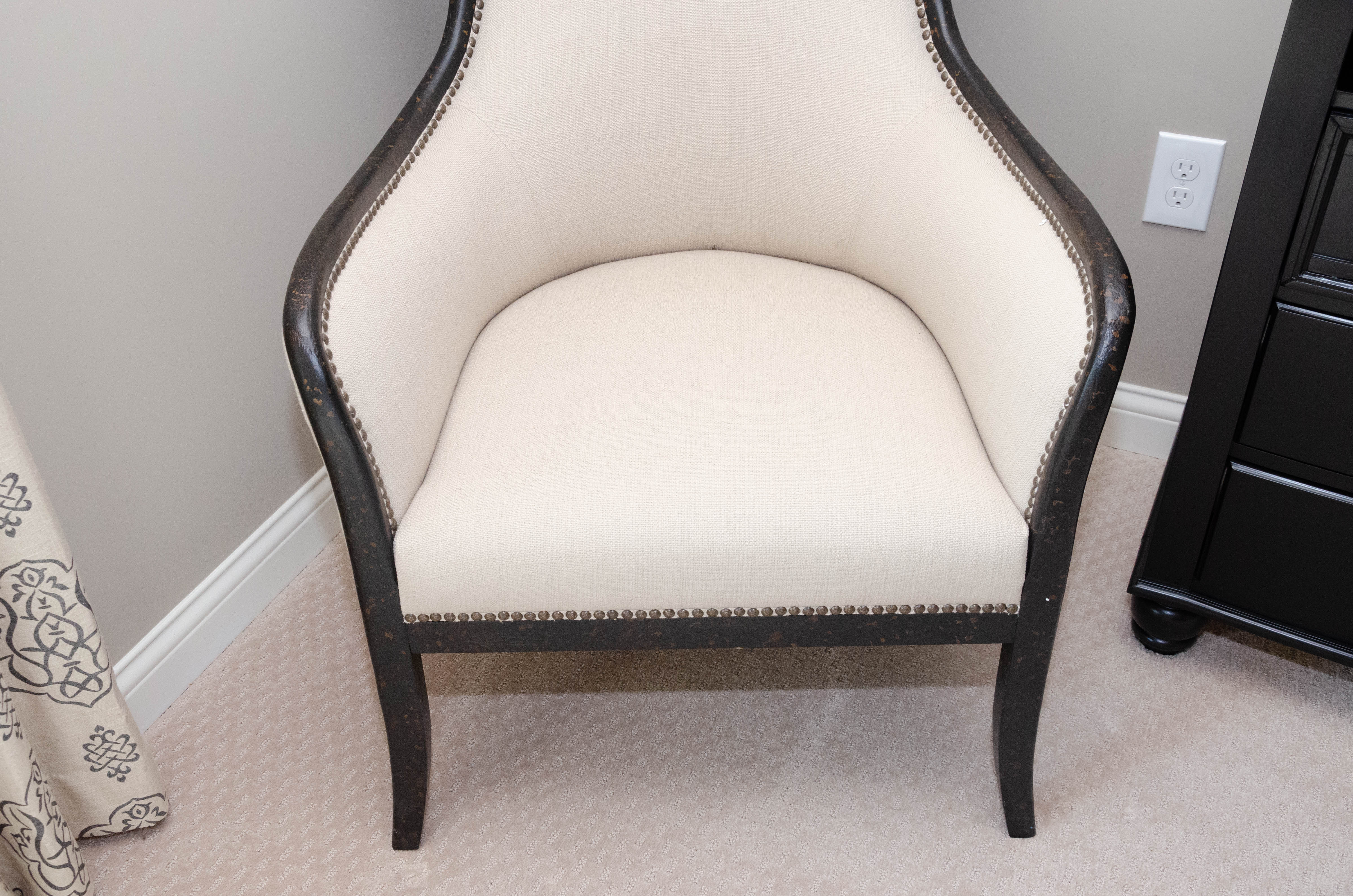 Uttermost Upholstered Armchair with Ebonized Wood Frame and Brass Tack Details