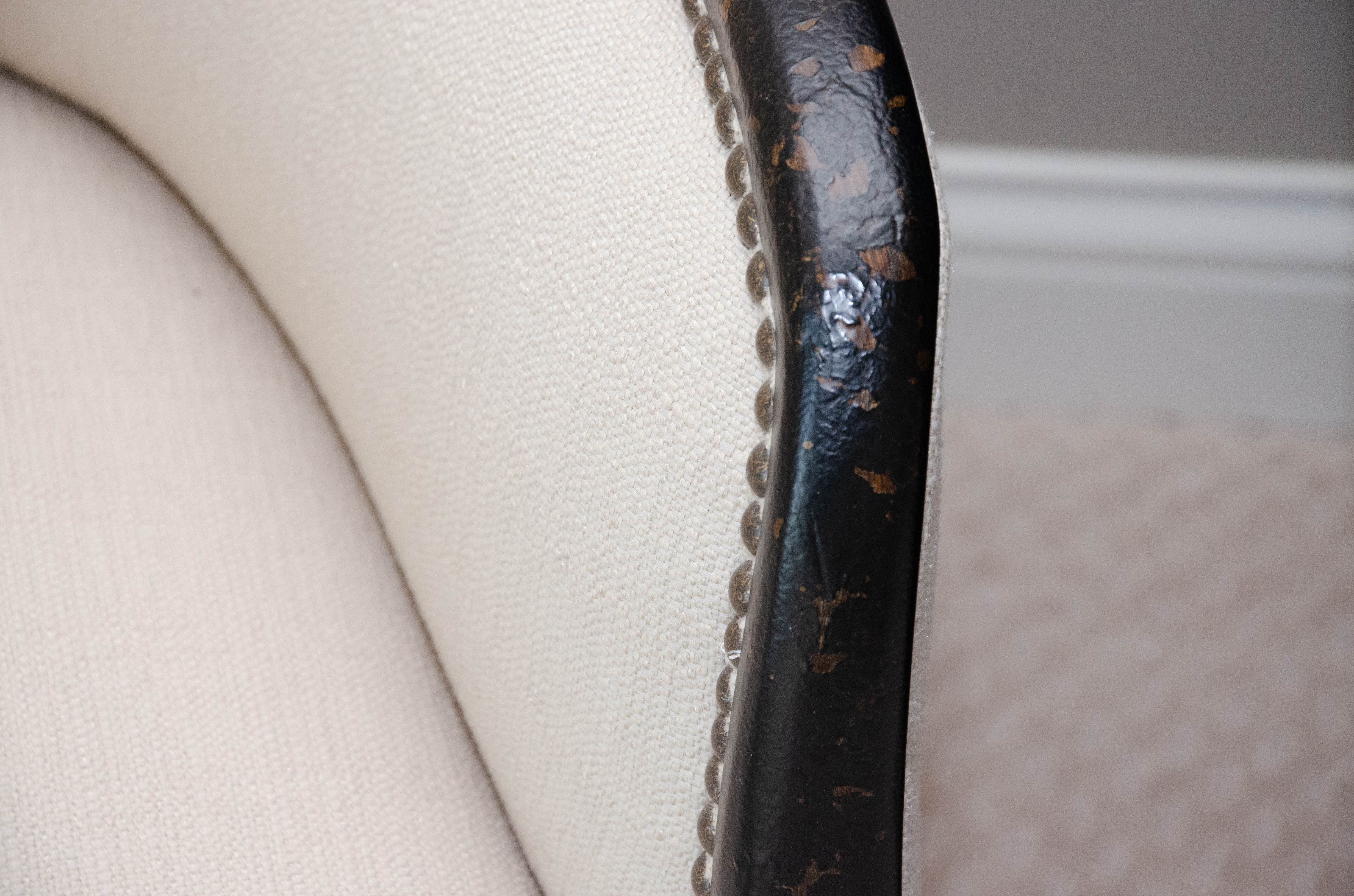 Uttermost Upholstered Armchair with Ebonized Wood Frame and Brass Tack Details