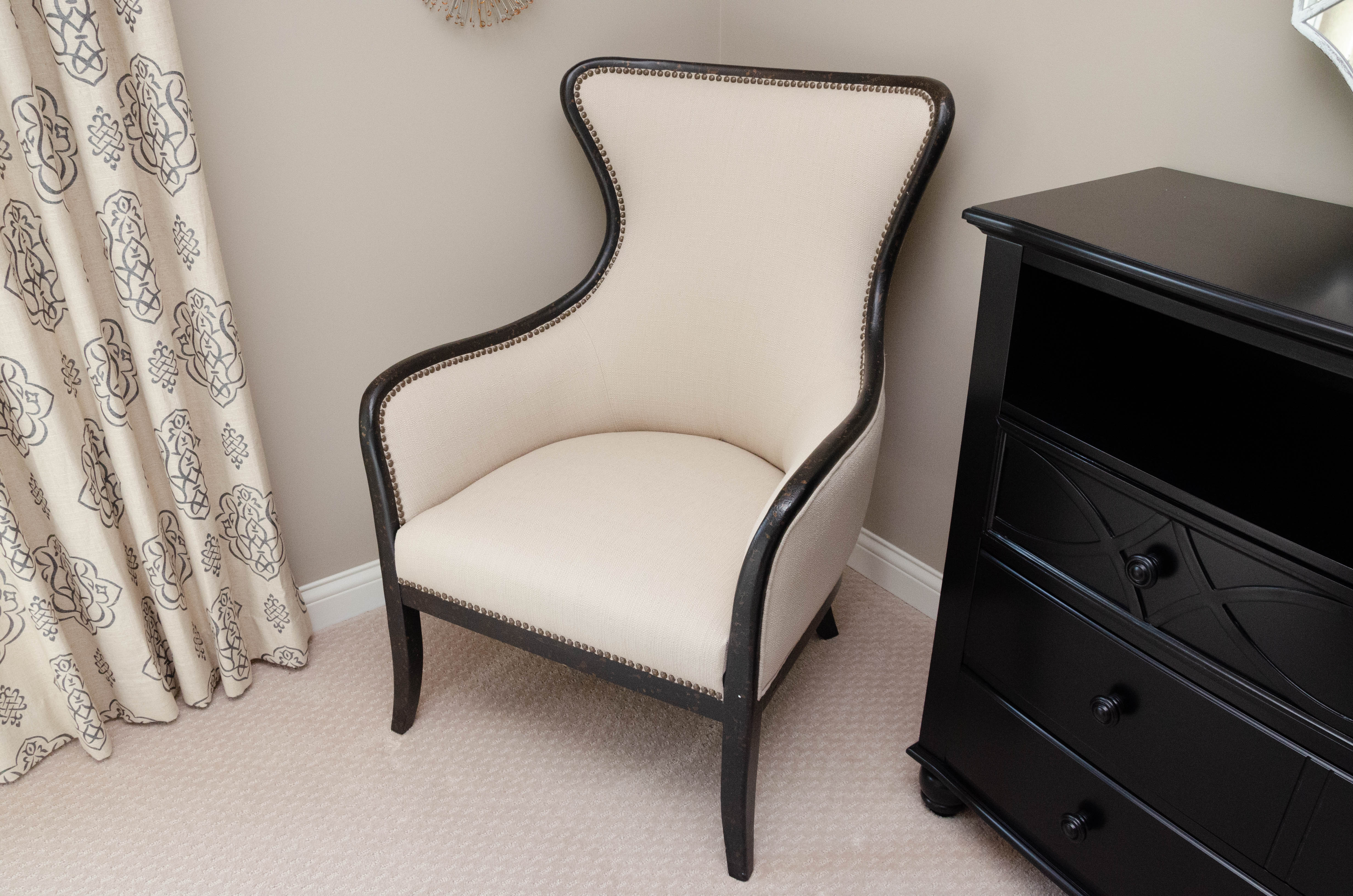 Uttermost Upholstered Armchair with Ebonized Wood Frame and Brass Tack Details