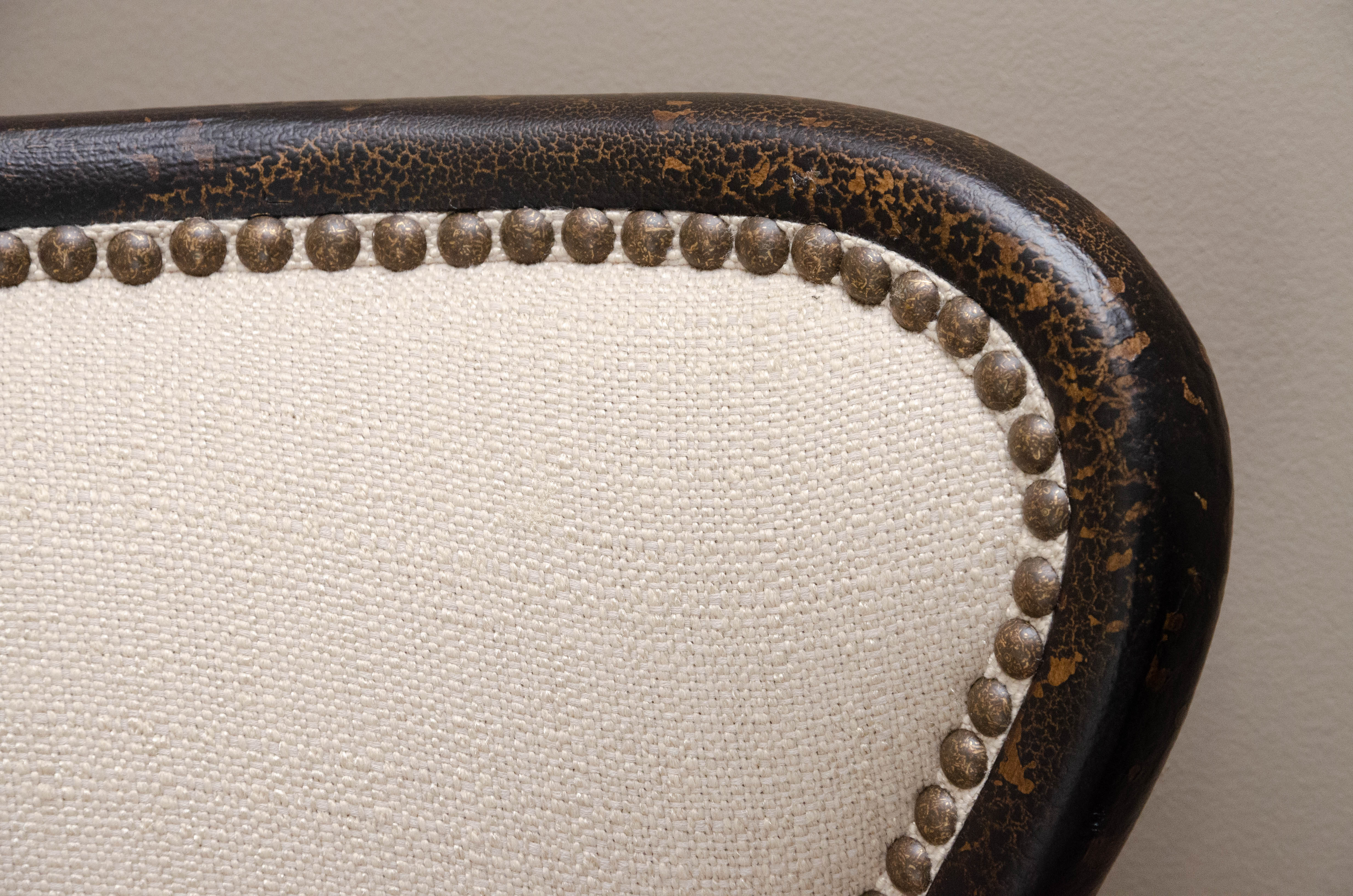 Uttermost Upholstered Armchair with Ebonized Wood Frame and Brass Tack Details