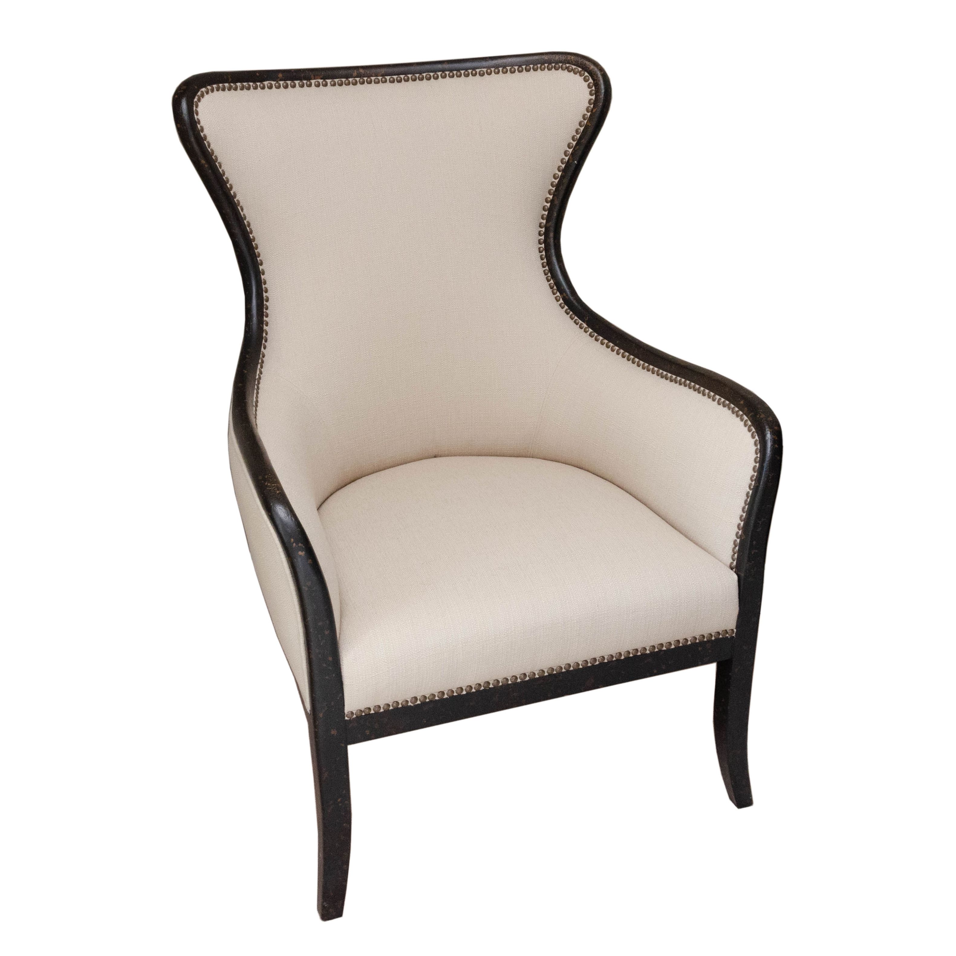 Uttermost Upholstered Armchair with Ebonized Wood Frame and Brass Tack Details