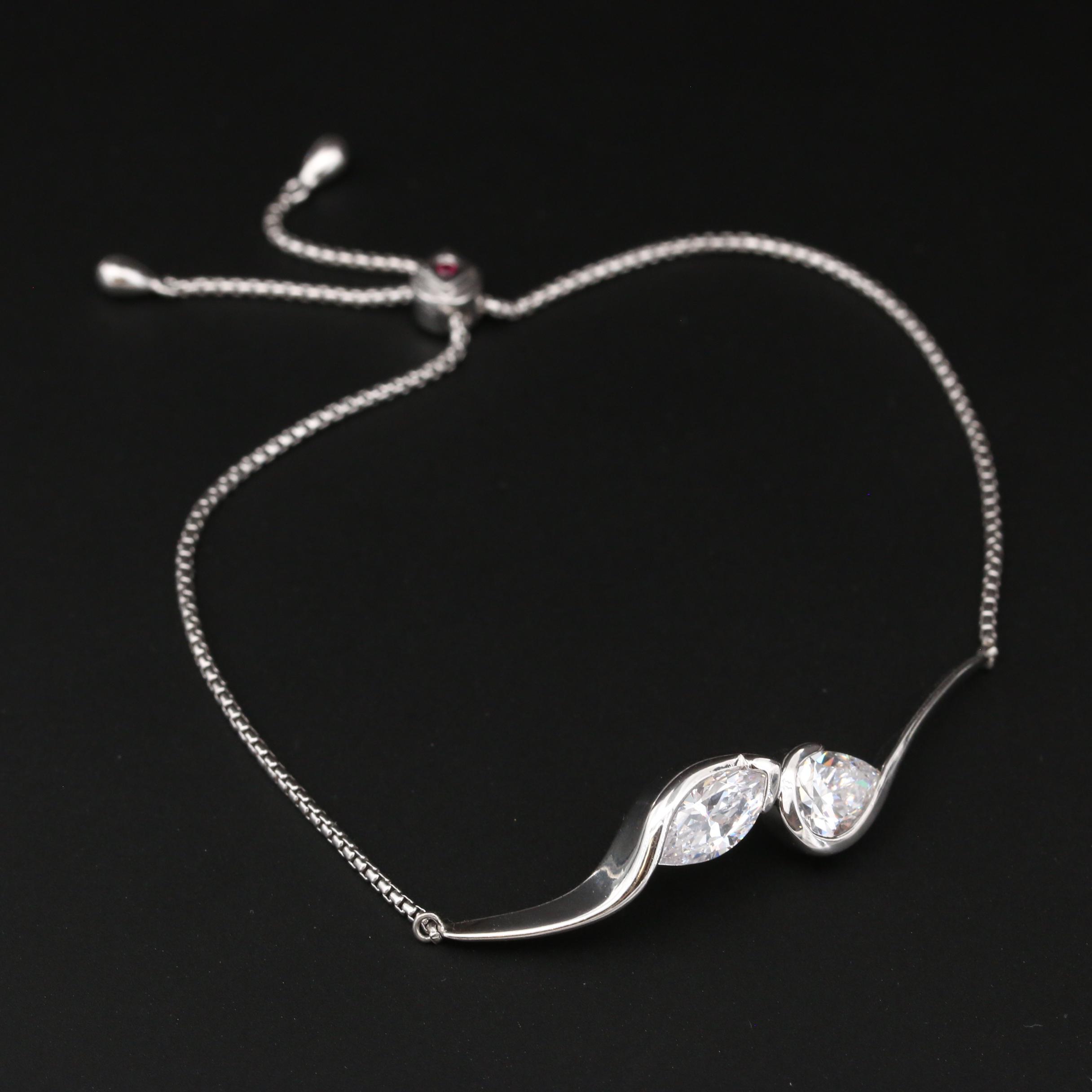 ELLE Sterling Silver Cubic Zirconia and Ruby "Toi Et Moi" Bracelet