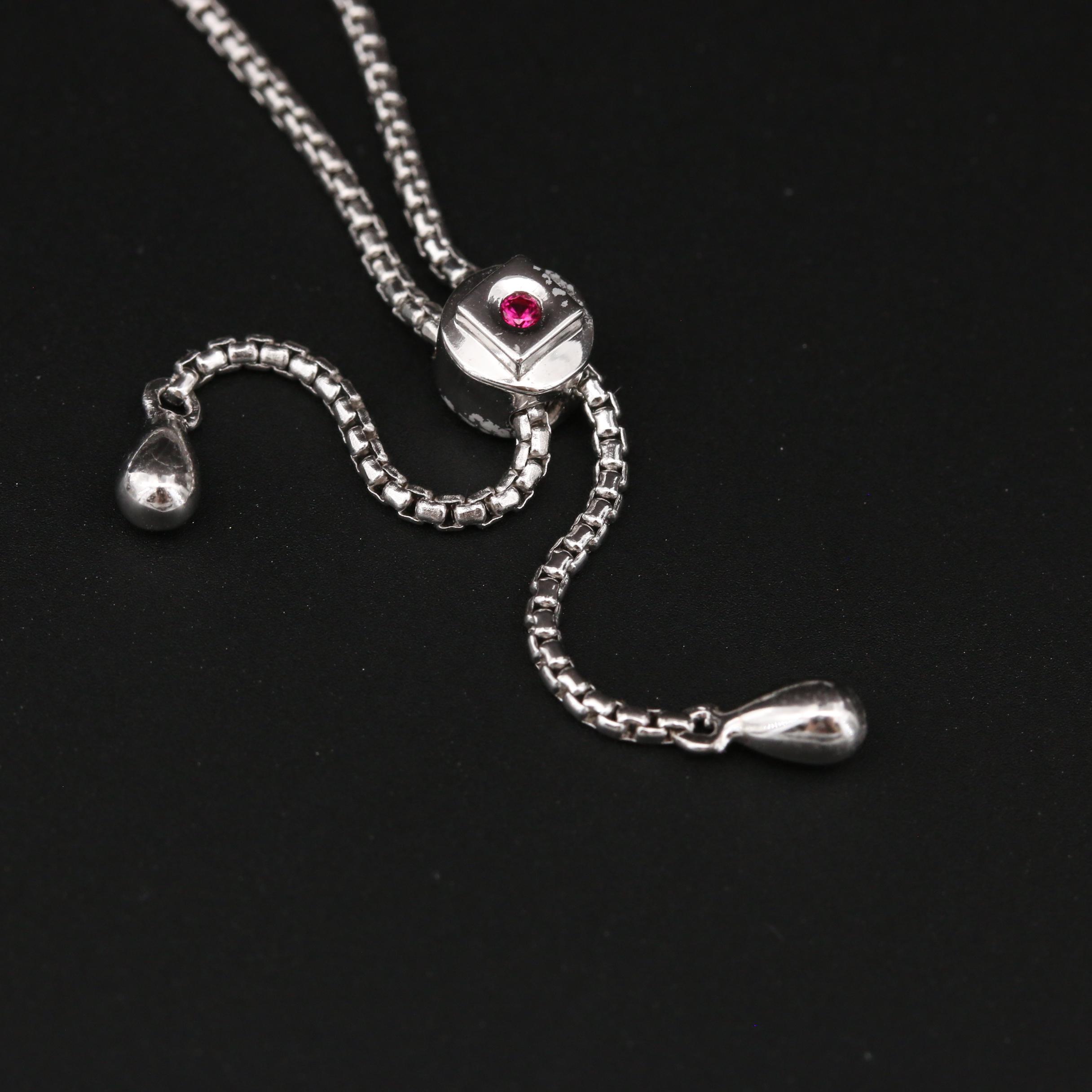 ELLE Sterling Silver Cubic Zirconia and Ruby "Toi Et Moi" Bracelet