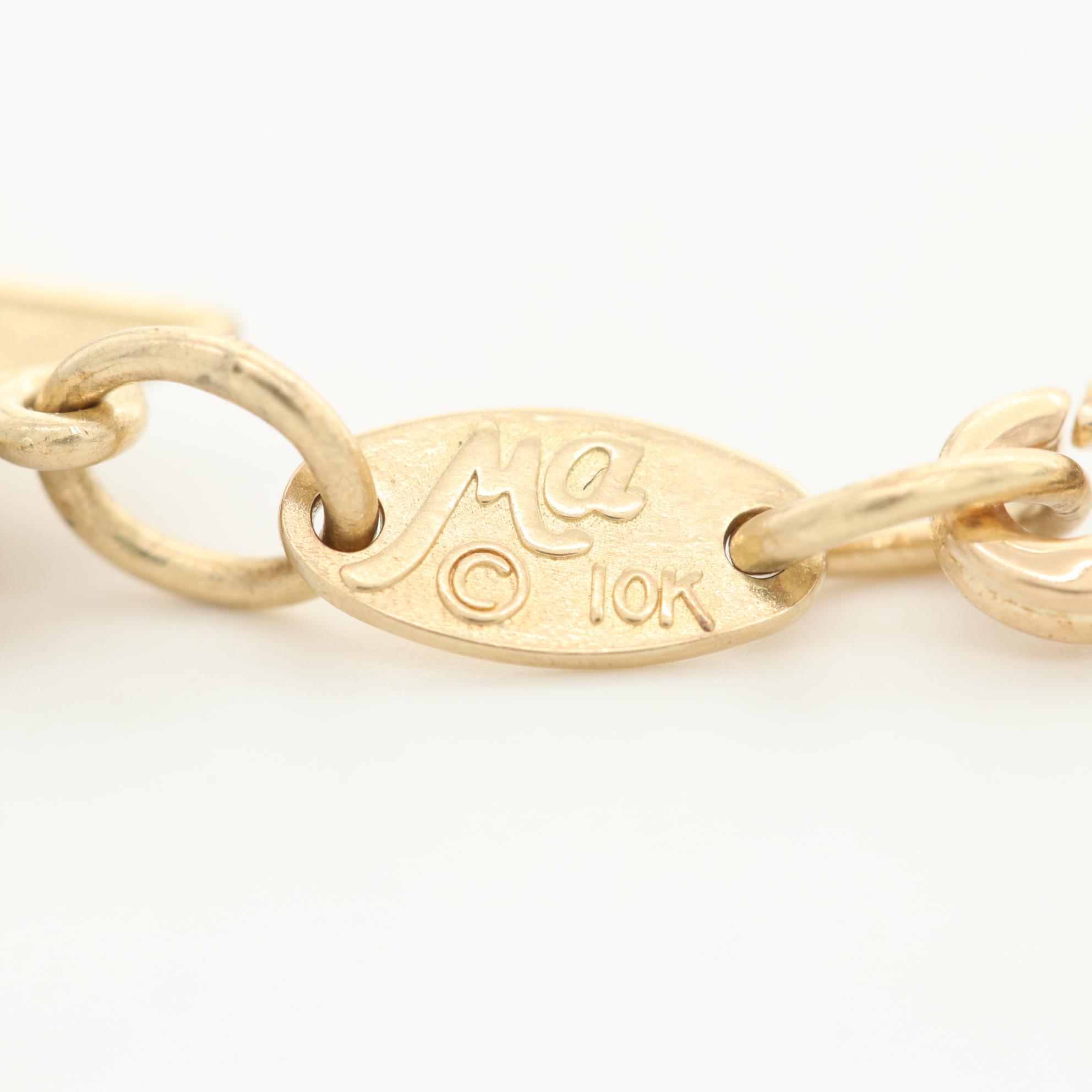 10K Yellow Gold Bracelet with Sun, Moon, Stars and Planet Motif