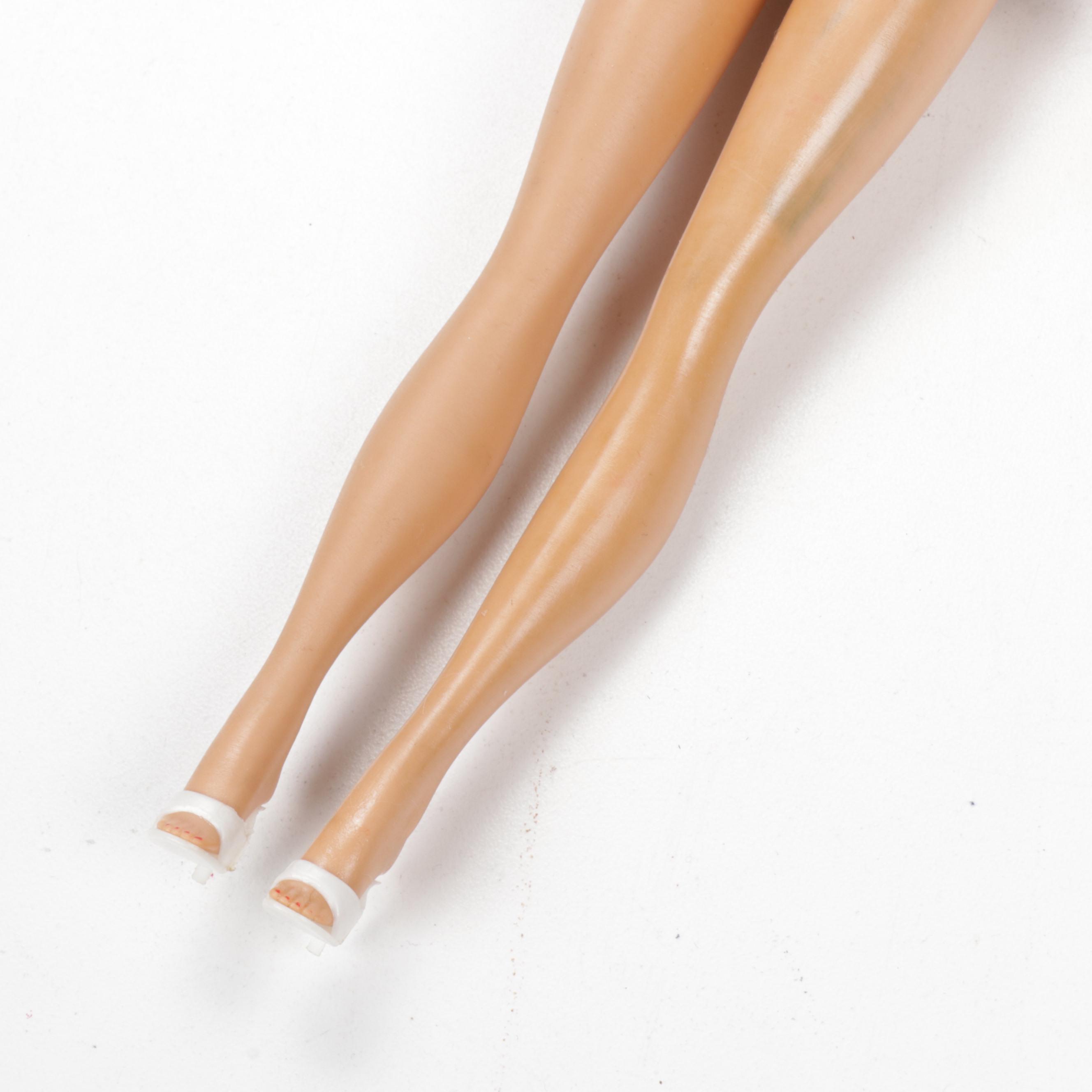 Mattel Barbie, Ken, and Midge Dolls with Carrying Cases and Clothing, 1960s