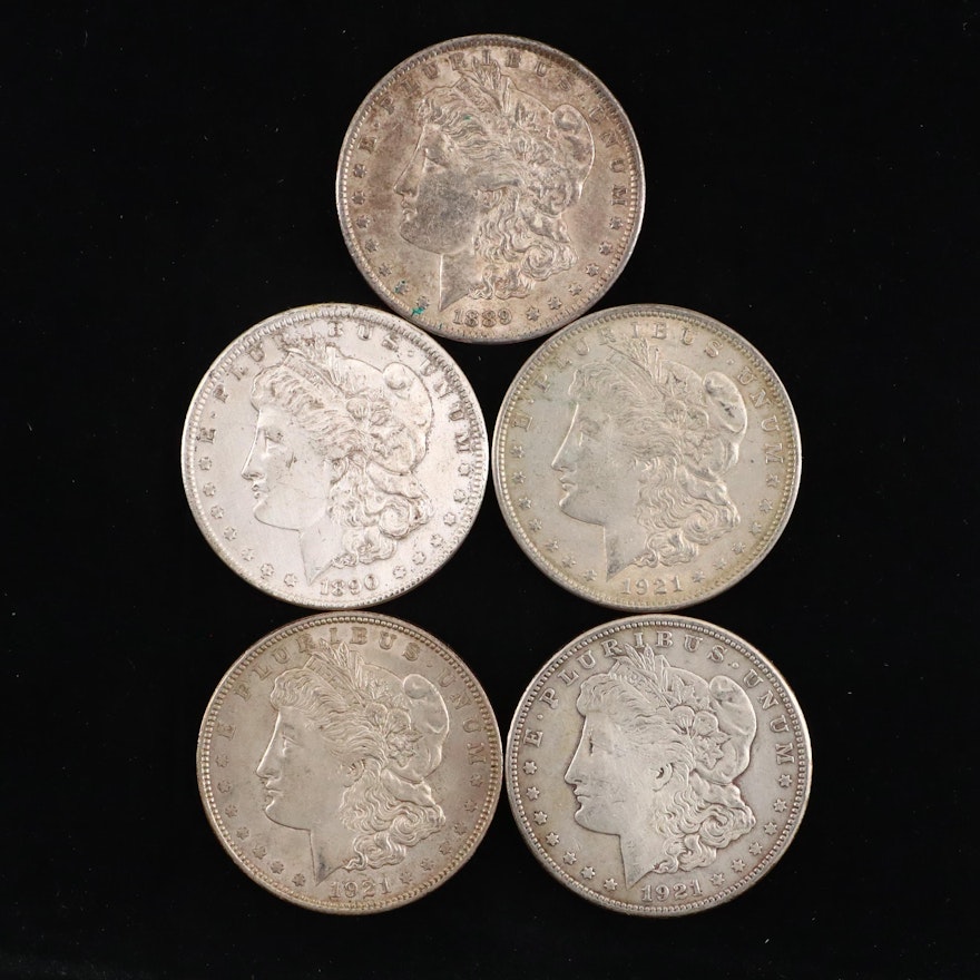 Five Silver Morgan Dollars Including 1889, 1921, and 1921-S