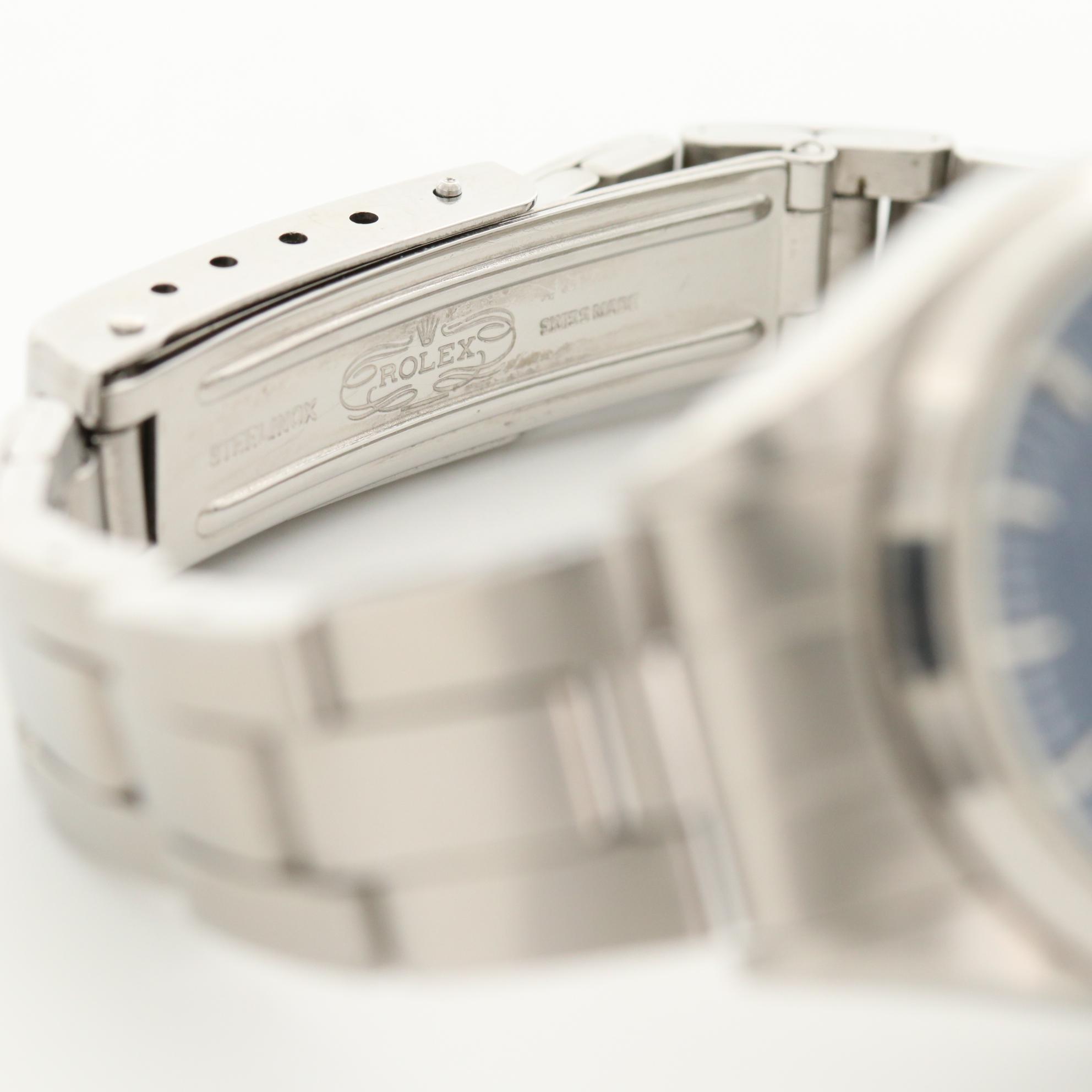 Vintage Rolex Oyster Perpetual Stainless Steel Watch With Date Window