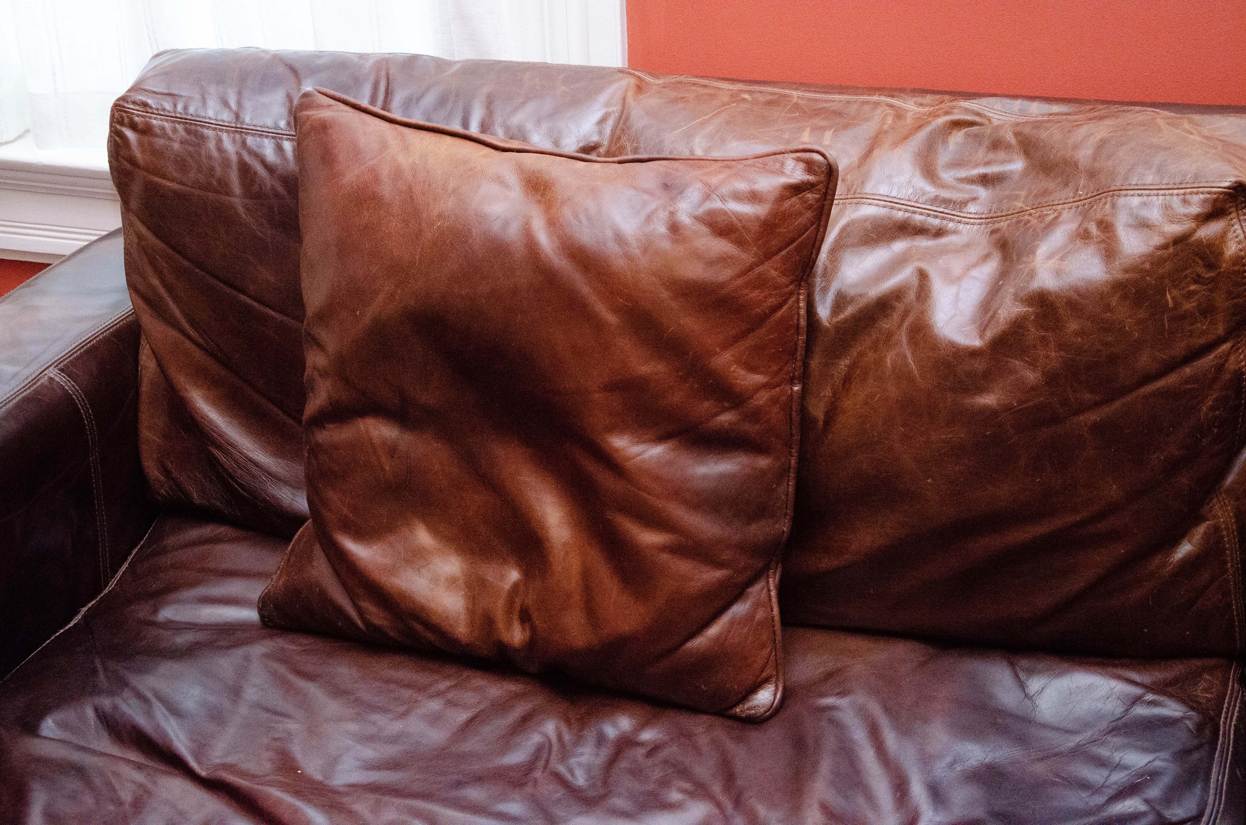 Modern Leather Upholstered Sofa with Hand Tufted and Leather Decorative Pillows