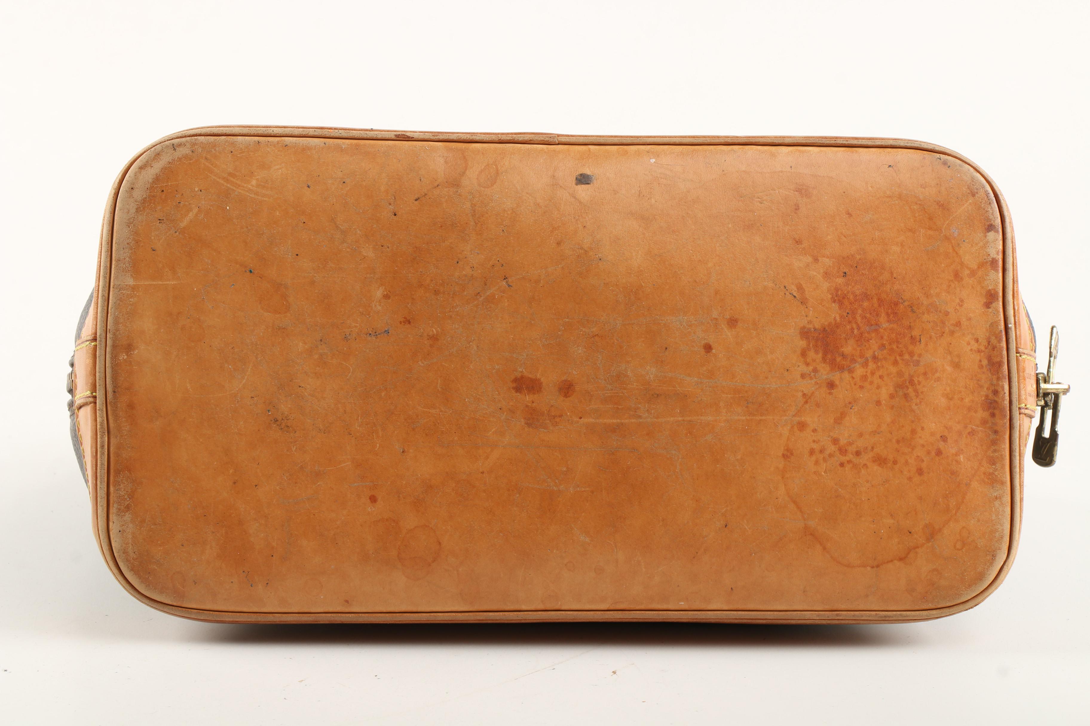 Louis Vuitton Alma PM Satchel in Monogram Canvas and Leather