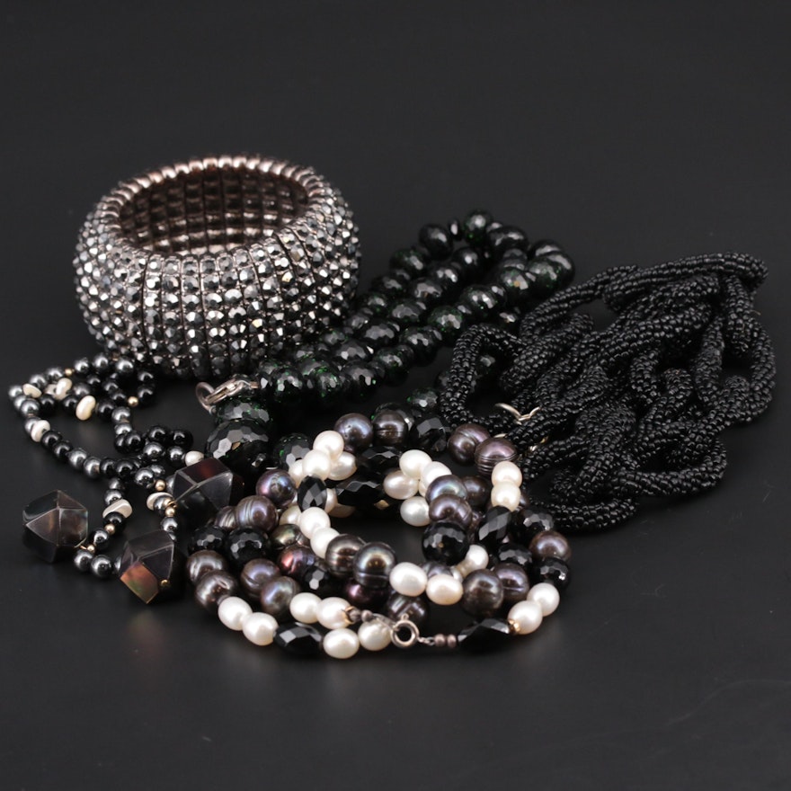 Assorted Costume Jewelry Including Black Onyx and Expandable Hematite Bracelet