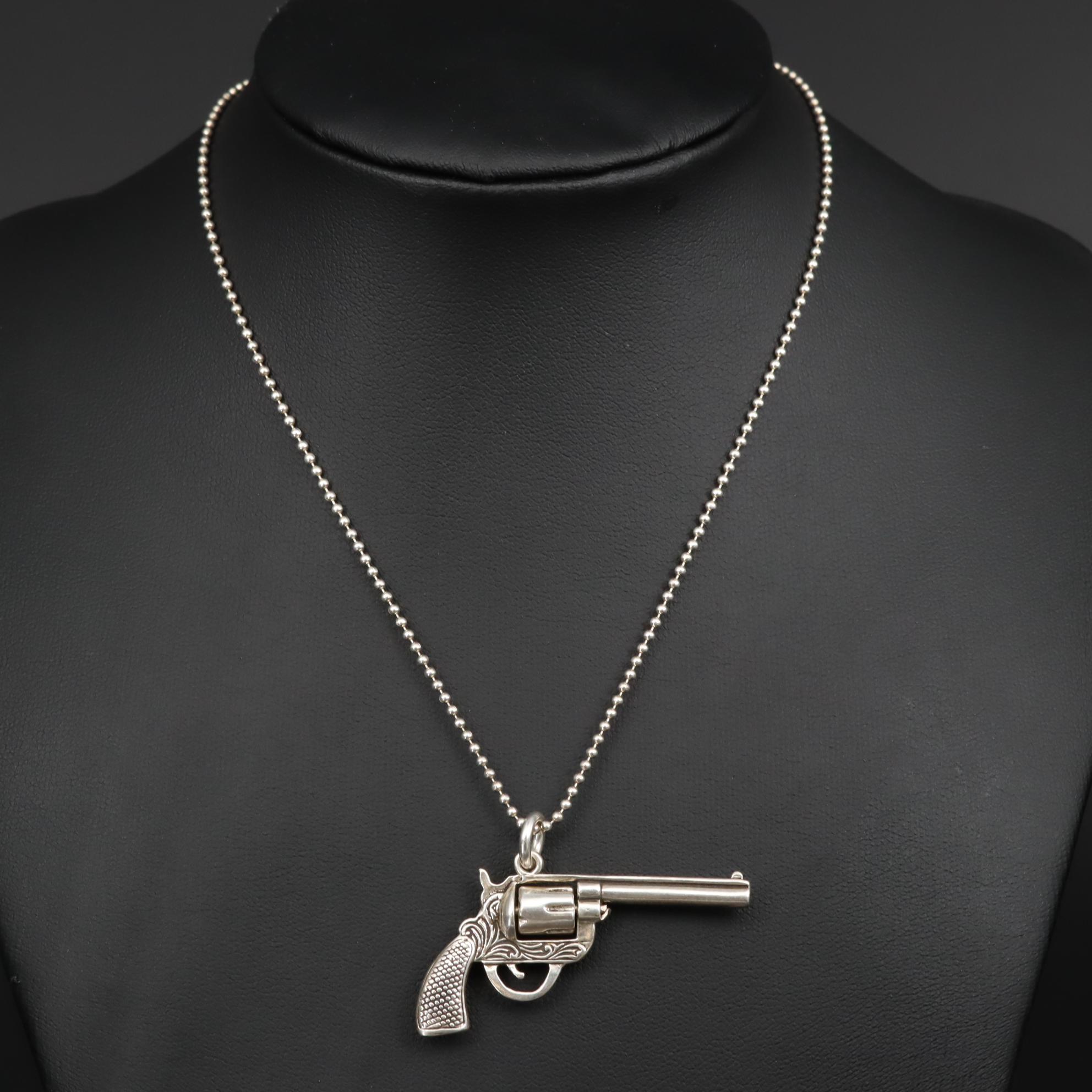 Sterling Silver Necklaces Including Cable Chain and Articulated Revolver Pendant