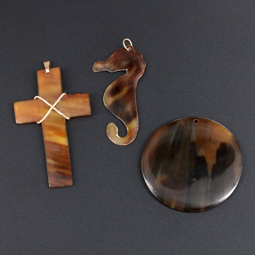 Tortoise Shell Pendant Assortment Featuring Cross and Seahorse