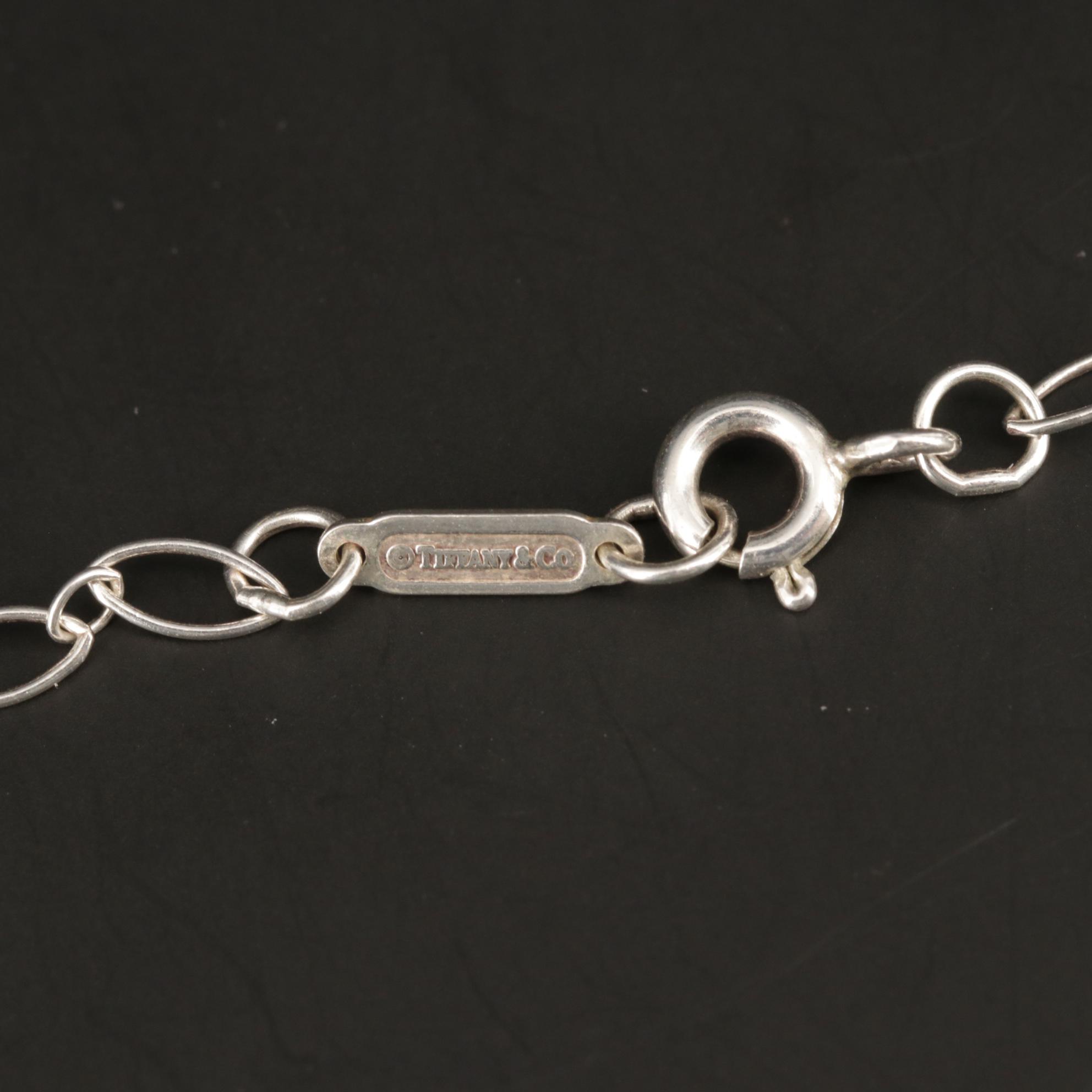 Tiffany & Co. "Daisy Key" Sterling Silver Diamond Pendant Necklace