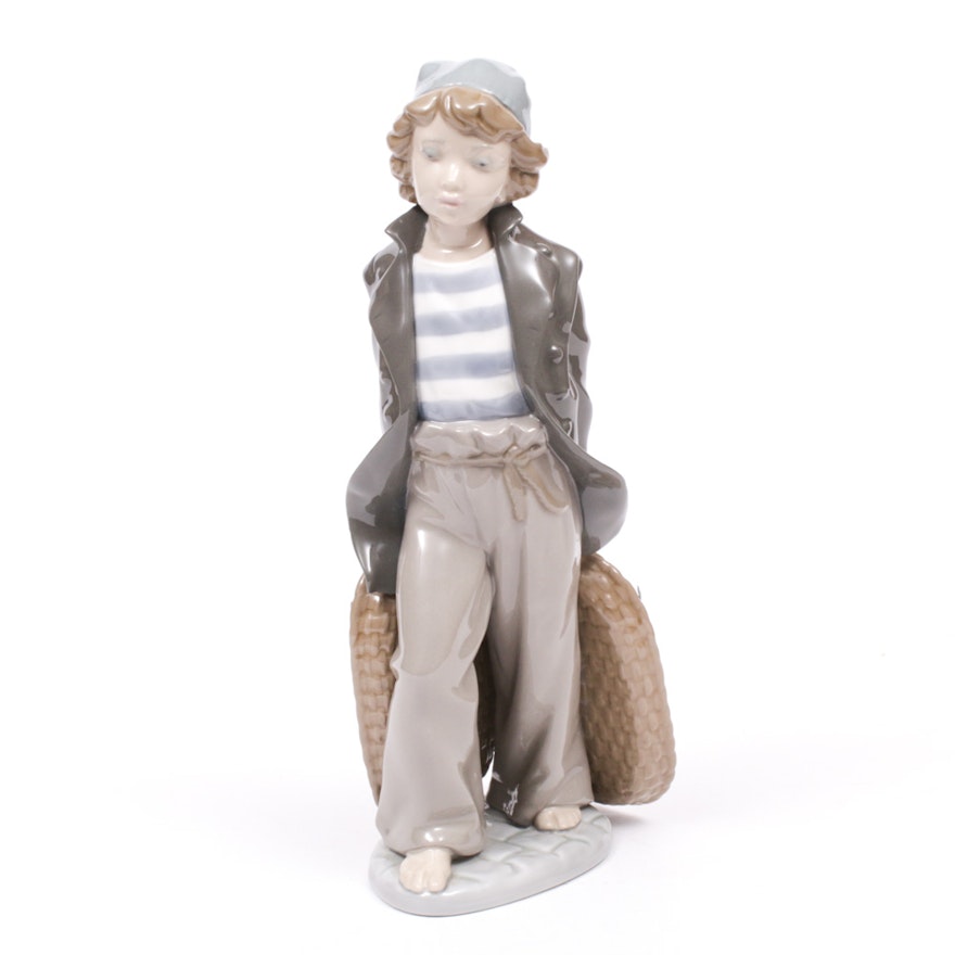 Lladró "Ship Boy with Baskets" Porcelain Figurine by Salvador Furió, 1980s