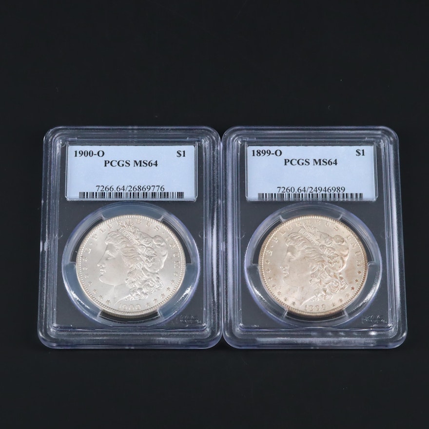 Two PCGS Graded MS64 Silver Morgan Dollars Including an 1899-O and 1900-O