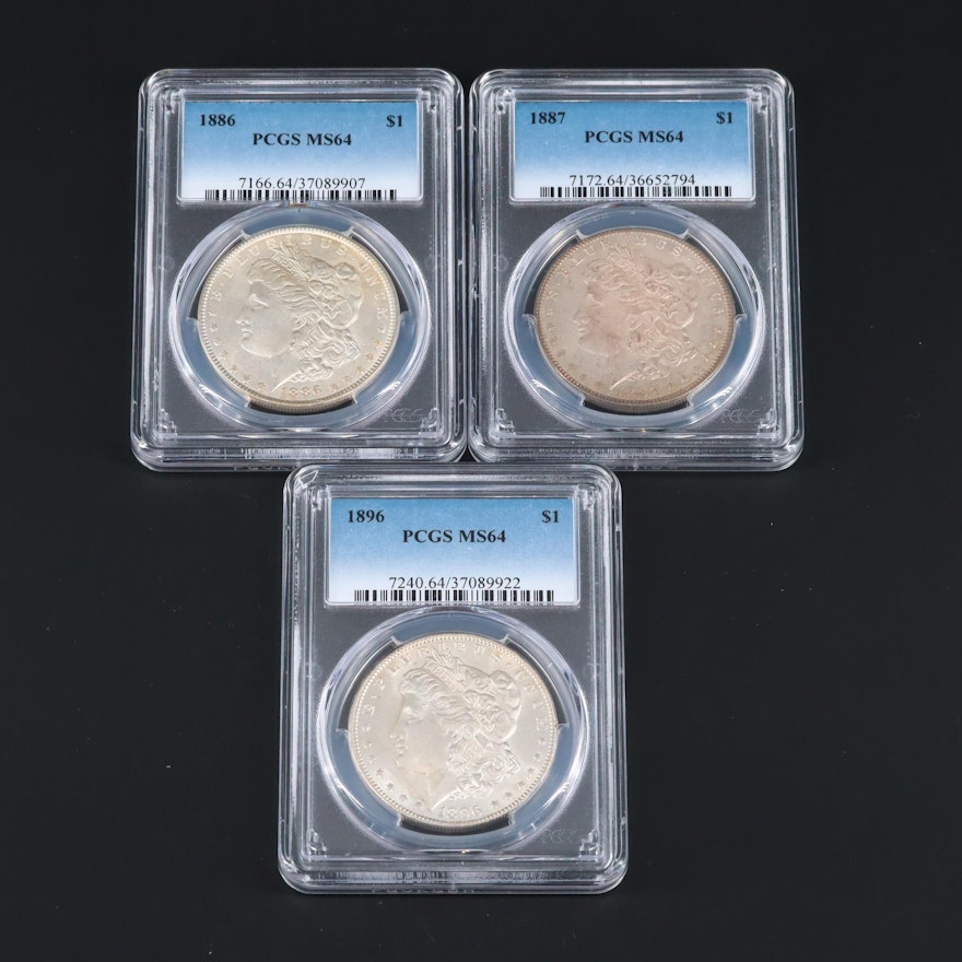 Three PCGS Graded MS64 Silver Morgan Dollars Including an 1887