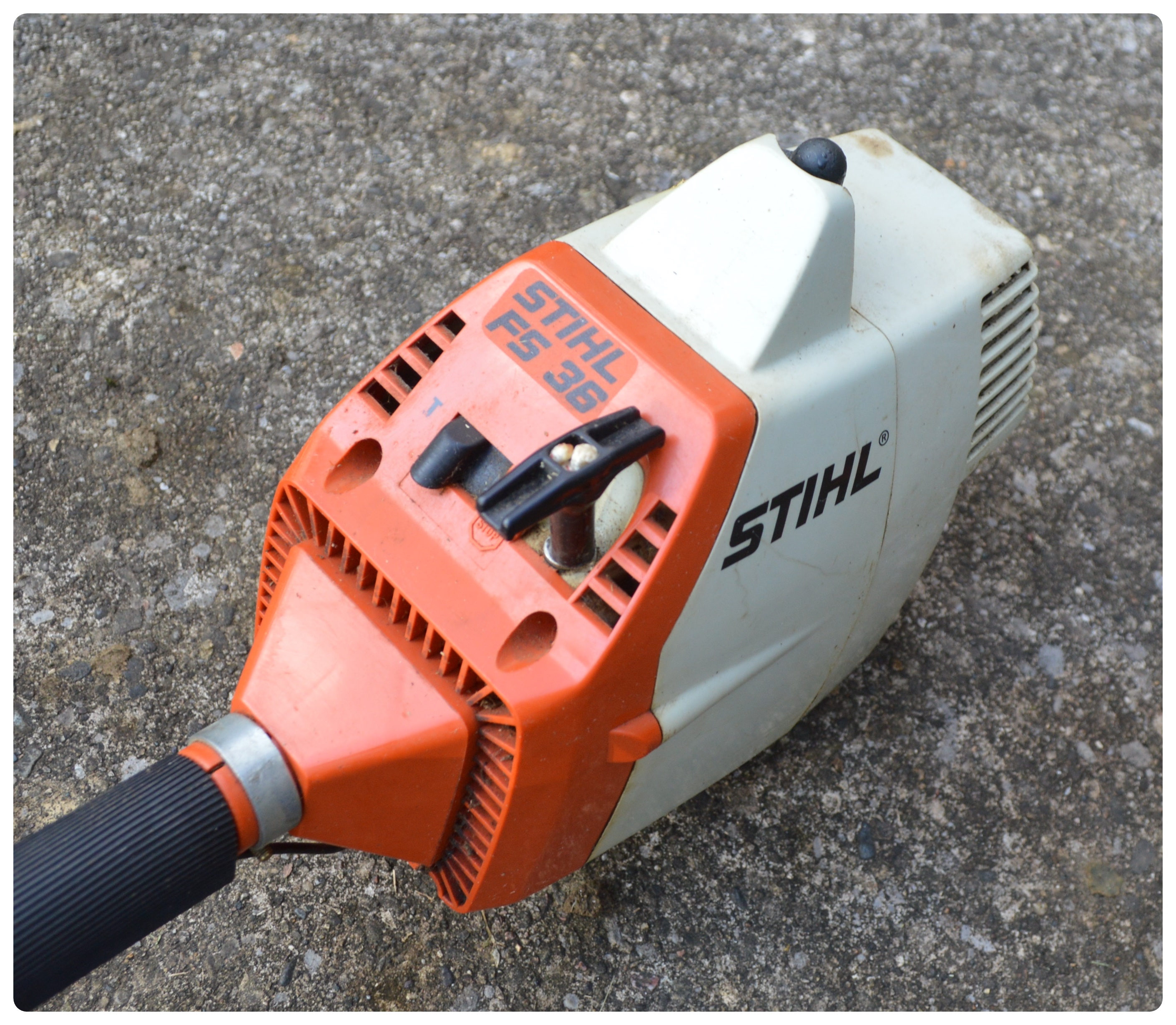 STIHL Gas Trimmer FS36 with Black+Decker Electric Edger 8224