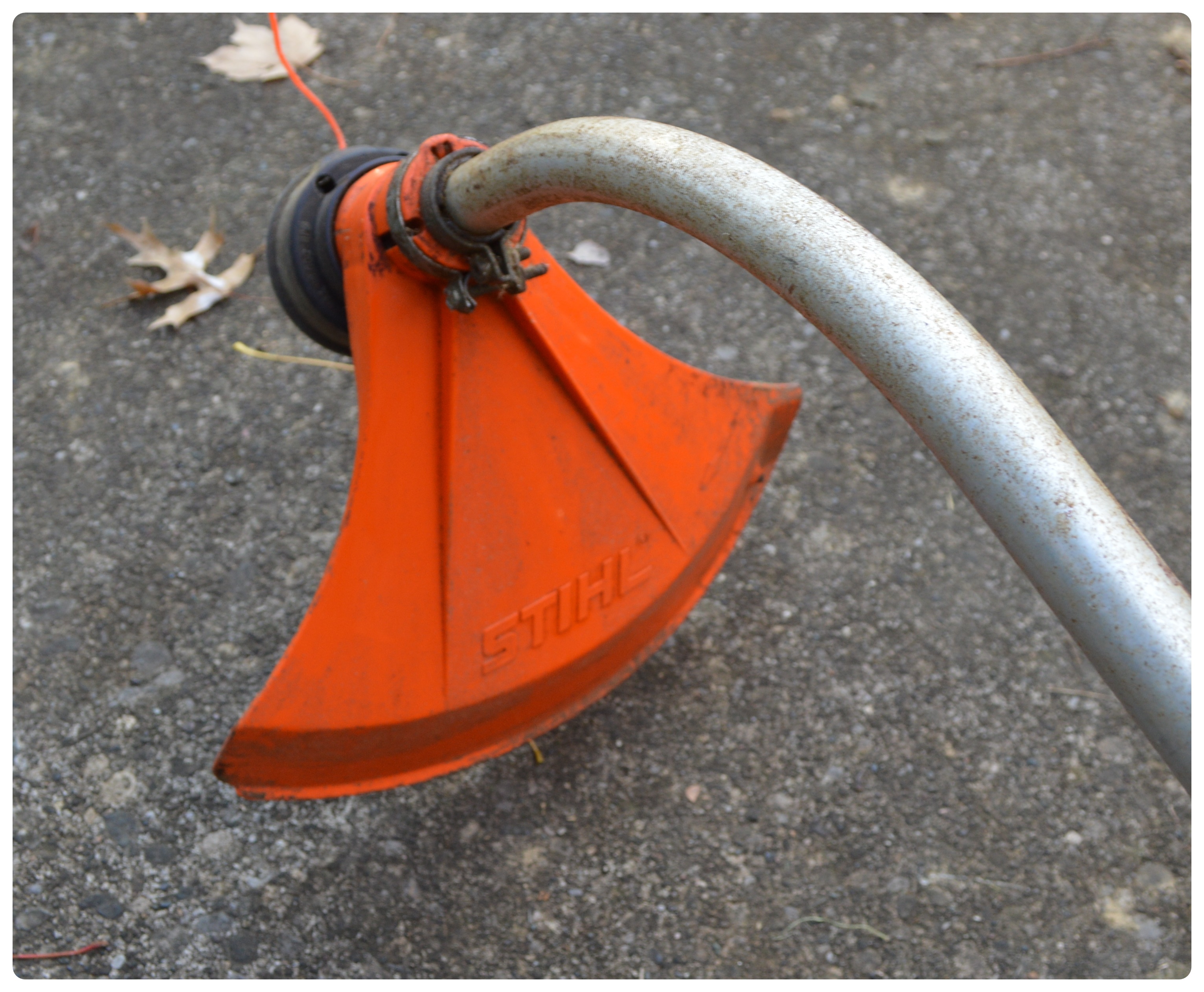 STIHL Gas Trimmer FS36 with Black+Decker Electric Edger 8224