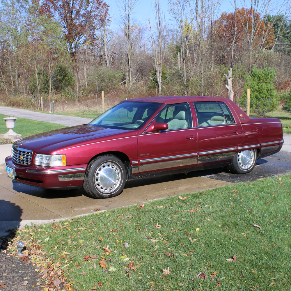 1999 Cadillac DeVille Tuxedo Edition Sedan in Crimson Pearl