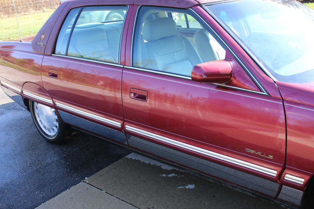 1999 Cadillac DeVille Tuxedo Edition Sedan in Crimson Pearl