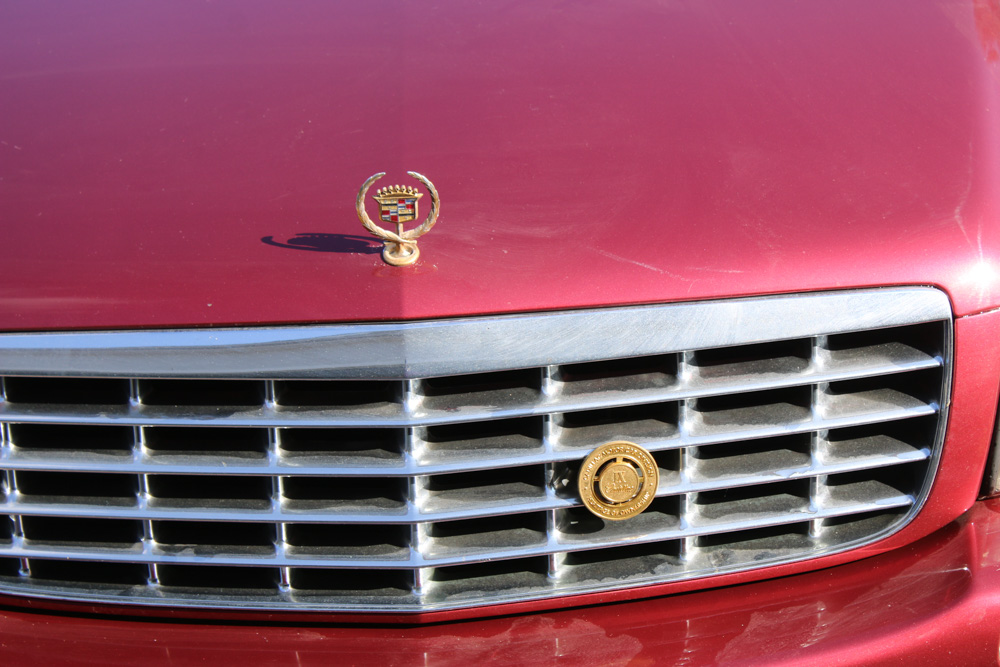 1999 Cadillac DeVille Tuxedo Edition Sedan in Crimson Pearl