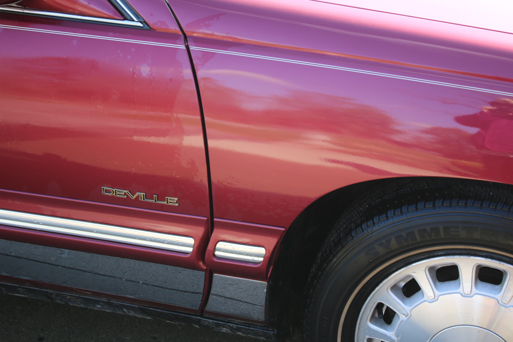 1999 Cadillac DeVille Tuxedo Edition Sedan in Crimson Pearl