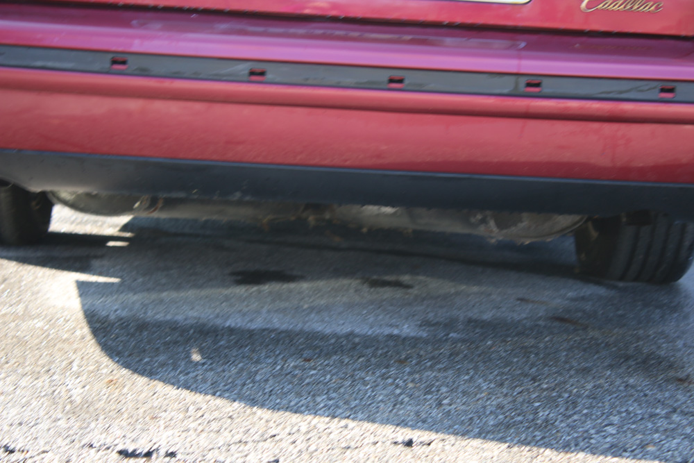 1999 Cadillac DeVille Tuxedo Edition Sedan in Crimson Pearl