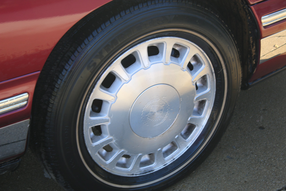 1999 Cadillac DeVille Tuxedo Edition Sedan in Crimson Pearl