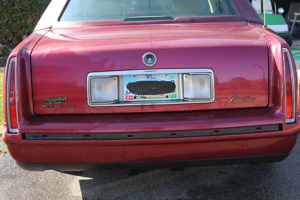 1999 Cadillac DeVille Tuxedo Edition Sedan in Crimson Pearl