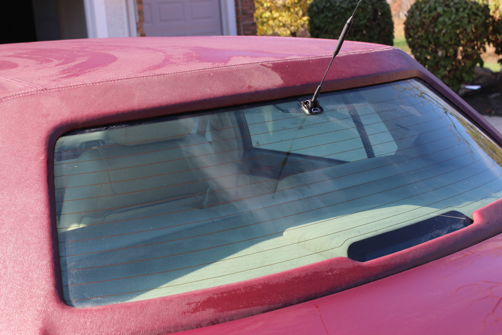 1999 Cadillac DeVille Tuxedo Edition Sedan in Crimson Pearl