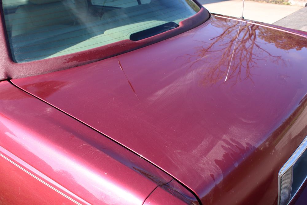 1999 Cadillac DeVille Tuxedo Edition Sedan in Crimson Pearl