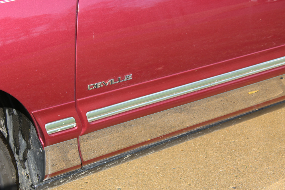 1999 Cadillac DeVille Tuxedo Edition Sedan in Crimson Pearl