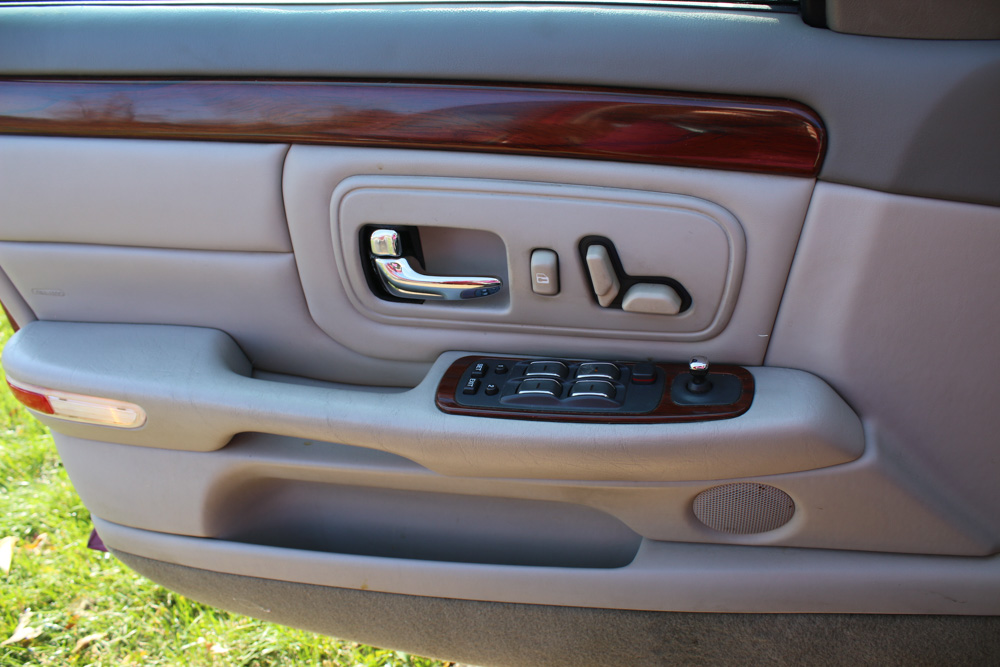 1999 Cadillac DeVille Tuxedo Edition Sedan in Crimson Pearl