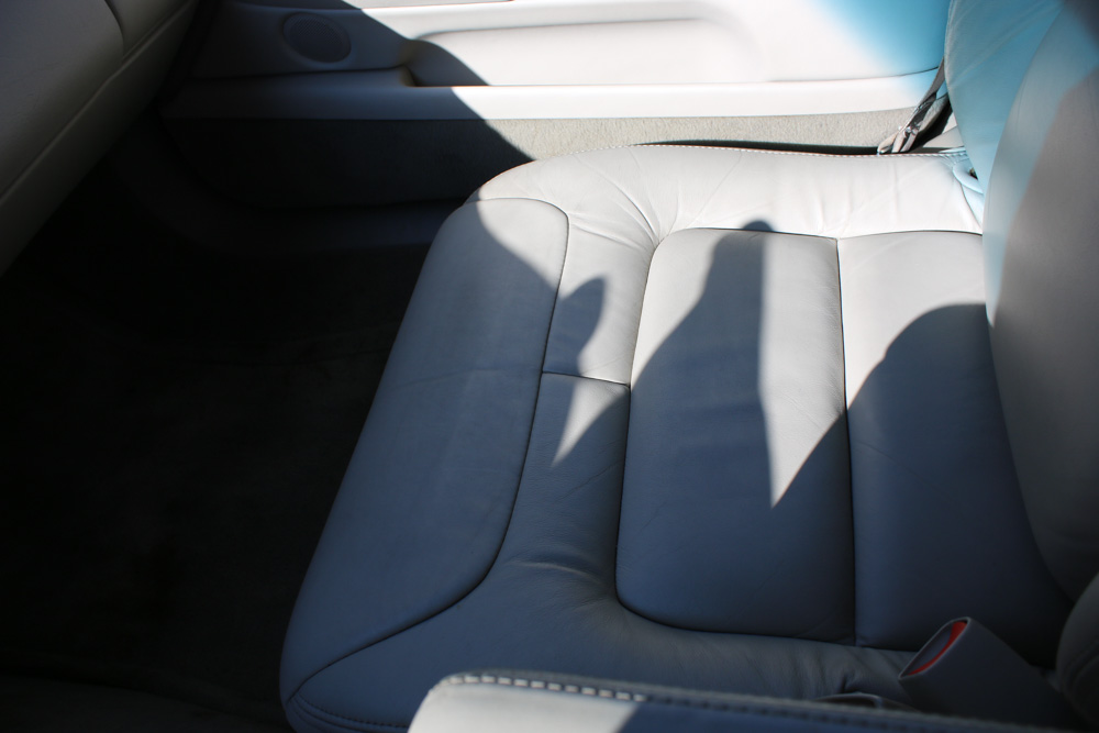 1999 Cadillac DeVille Tuxedo Edition Sedan in Crimson Pearl