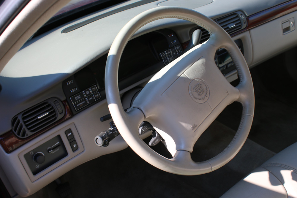 1999 Cadillac DeVille Tuxedo Edition Sedan in Crimson Pearl