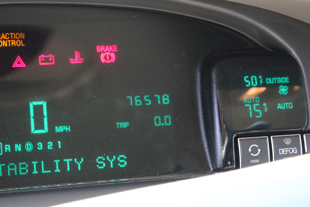 1999 Cadillac DeVille Tuxedo Edition Sedan in Crimson Pearl