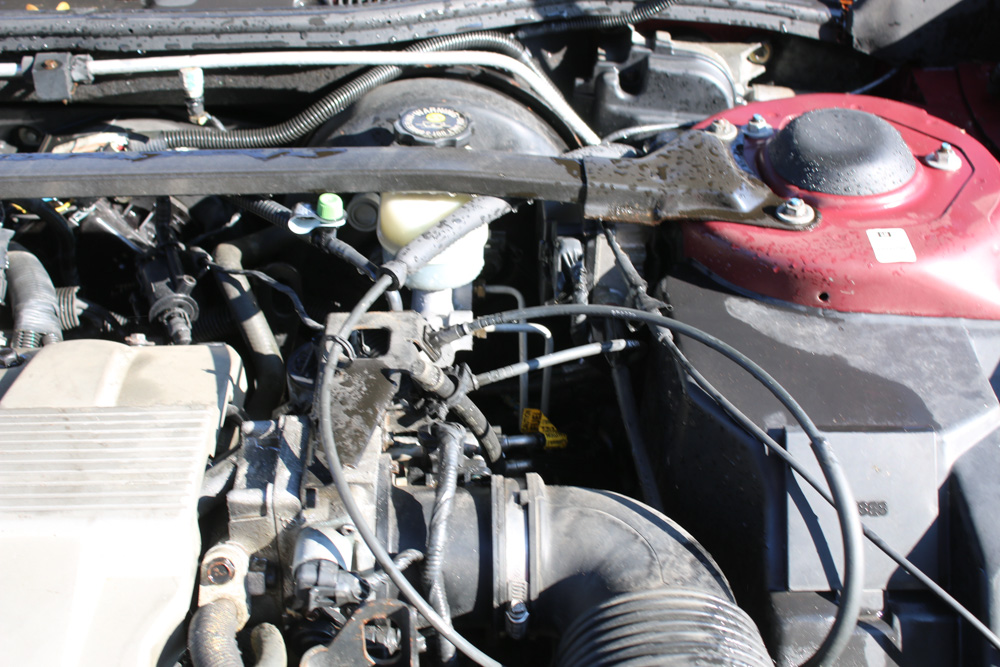 1999 Cadillac DeVille Tuxedo Edition Sedan in Crimson Pearl