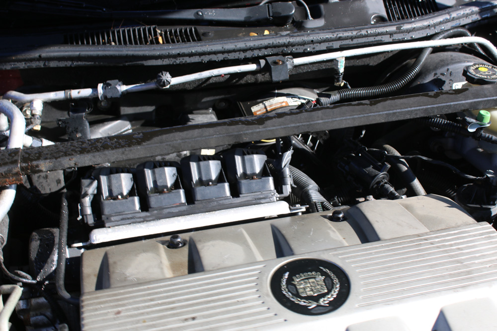 1999 Cadillac DeVille Tuxedo Edition Sedan in Crimson Pearl