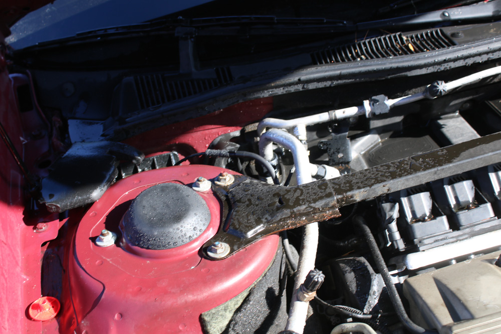 1999 Cadillac DeVille Tuxedo Edition Sedan in Crimson Pearl