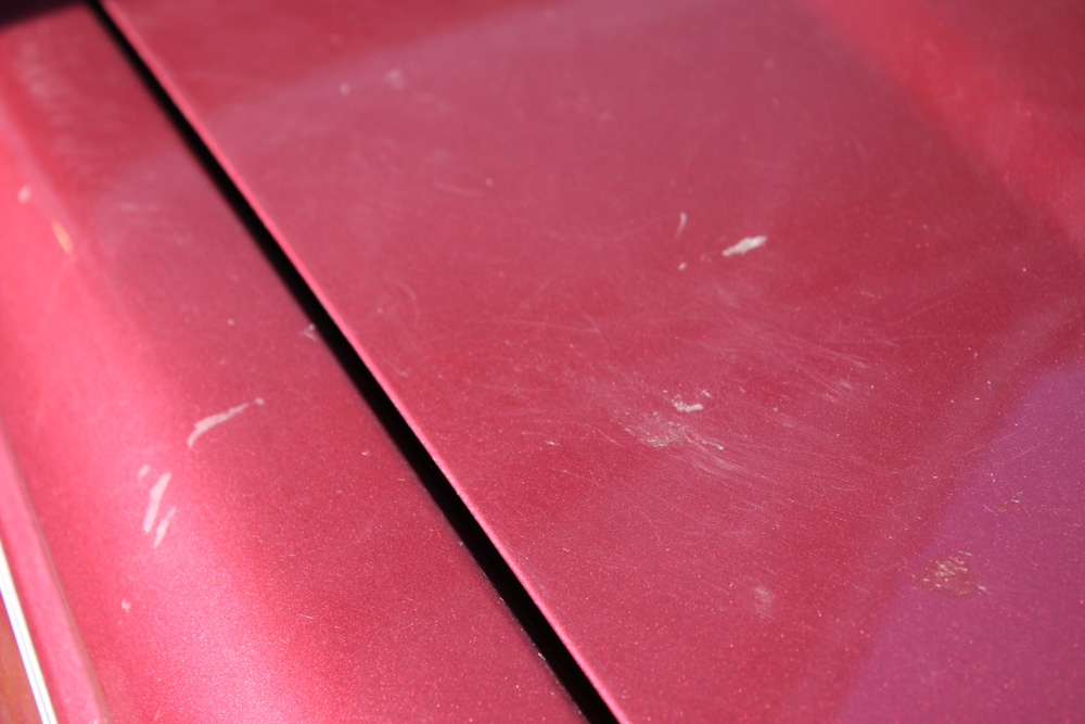 1999 Cadillac DeVille Tuxedo Edition Sedan in Crimson Pearl