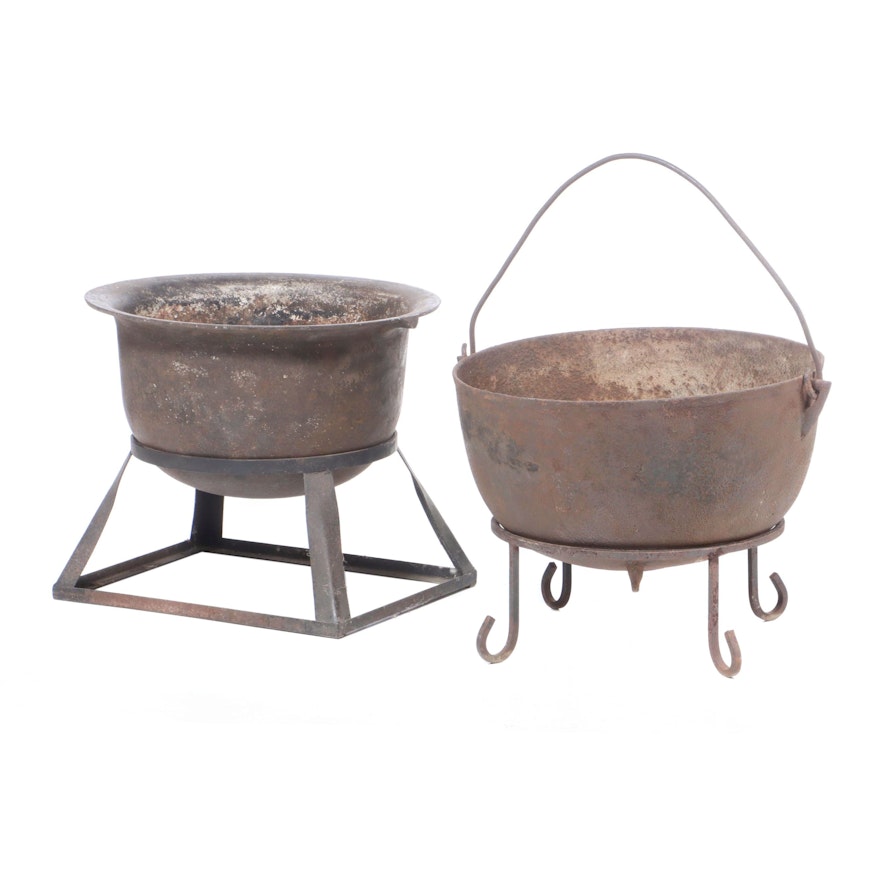 Two Antique Iron Cauldrons Plus Stands