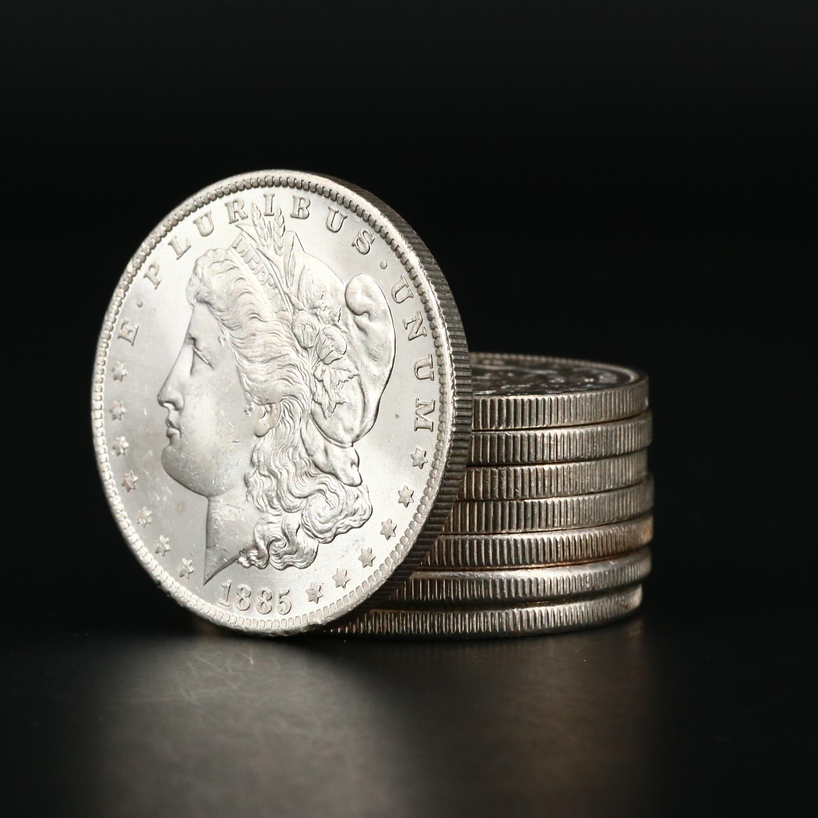 Eight Uncirculated Morgan Silver Dollars