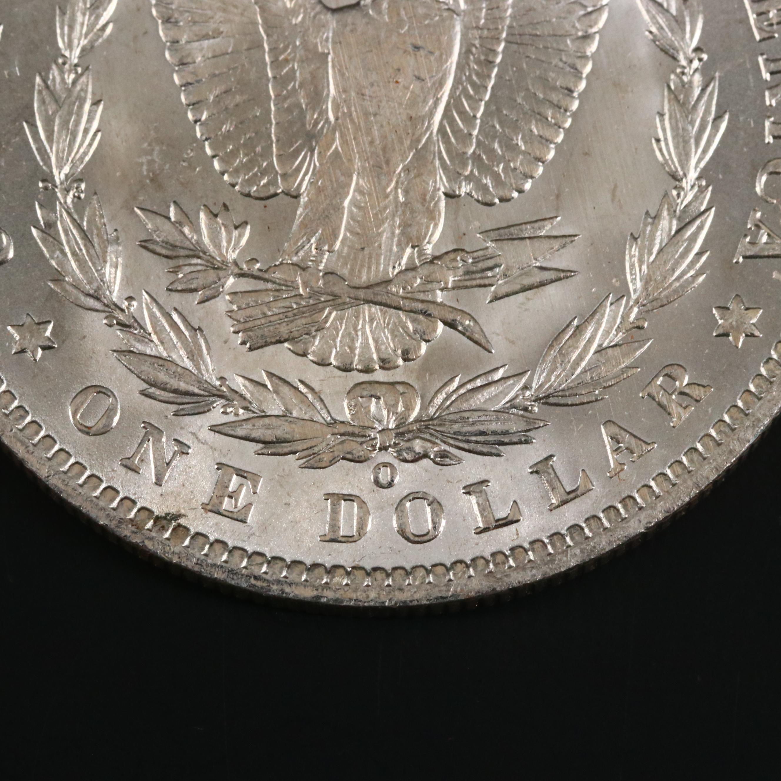 Eight Uncirculated Morgan Silver Dollars