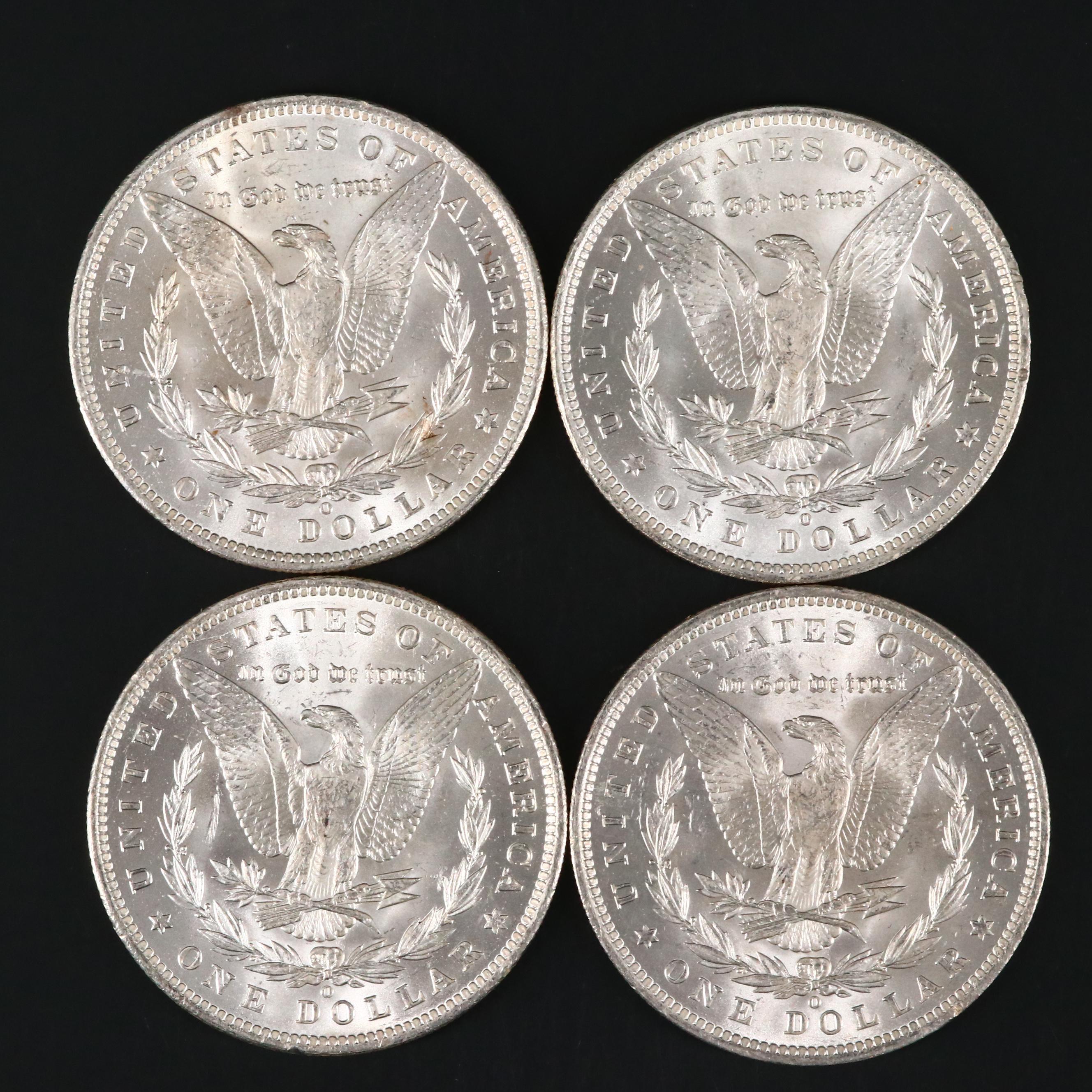 Eight Uncirculated Morgan Silver Dollars